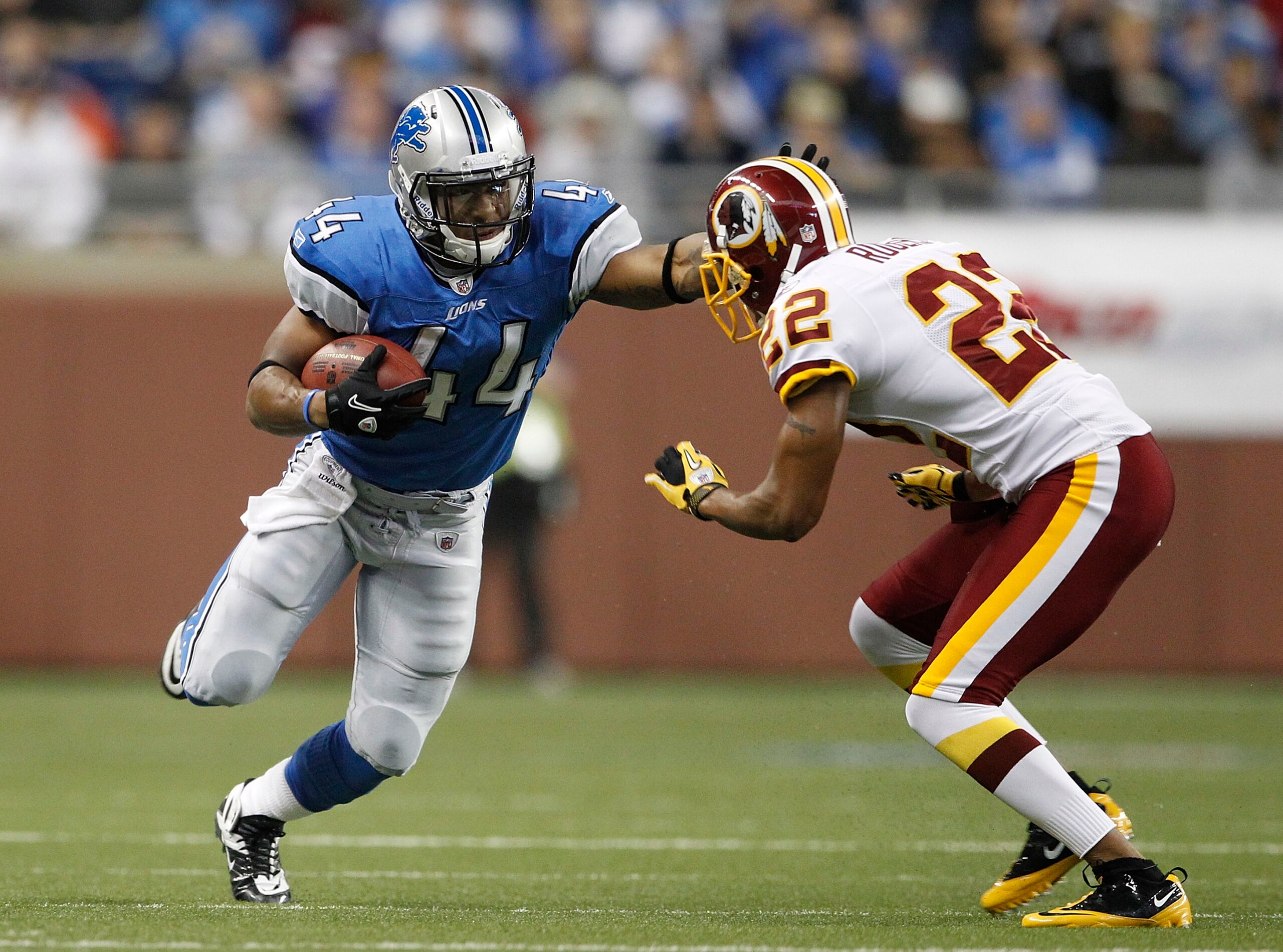 DETROIT - OCTOBER 31: Jahvid Best #44 of the Detroit Lions runs for a first down as Carlos Rogers #22 of the Washington Redskins gets ready to make the stop during the first quarter of the game at Ford Field on October 31, 2010 in Detroit, Michigan. (Phot DETROIT - OCTOBER 31: Jahvid Best #44 of the Detroit Lions runs for a first down as Carlos Rogers #22 of the Washington Redskins gets ready to make the stop during the first quarter of the game at Ford Field on October 31, 2010 in Detroit, Michigan. (Phot