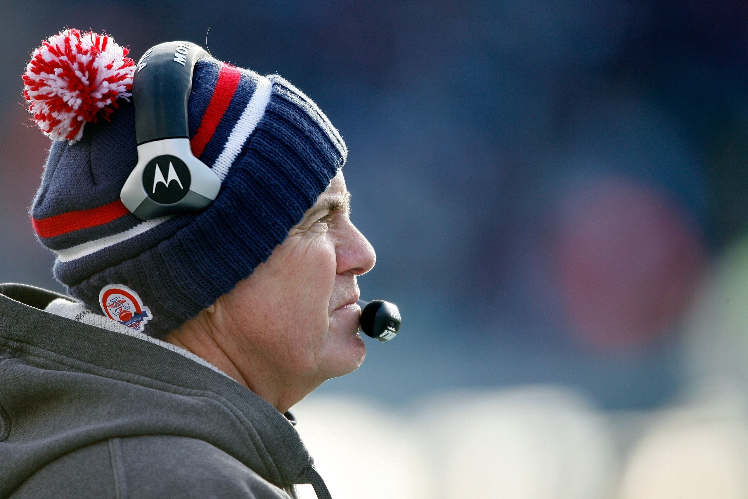 FOXBORO, MA - JANUARY 10:  Head coach Bill Belichick of the New England Patriots looks on against the Baltimore Ravens during the 2010 AFC wild-card playoff game at Gillette Stadium on January 10, 2010 in Foxboro, Massachusetts.  (Photo by Elsa/Getty Imag