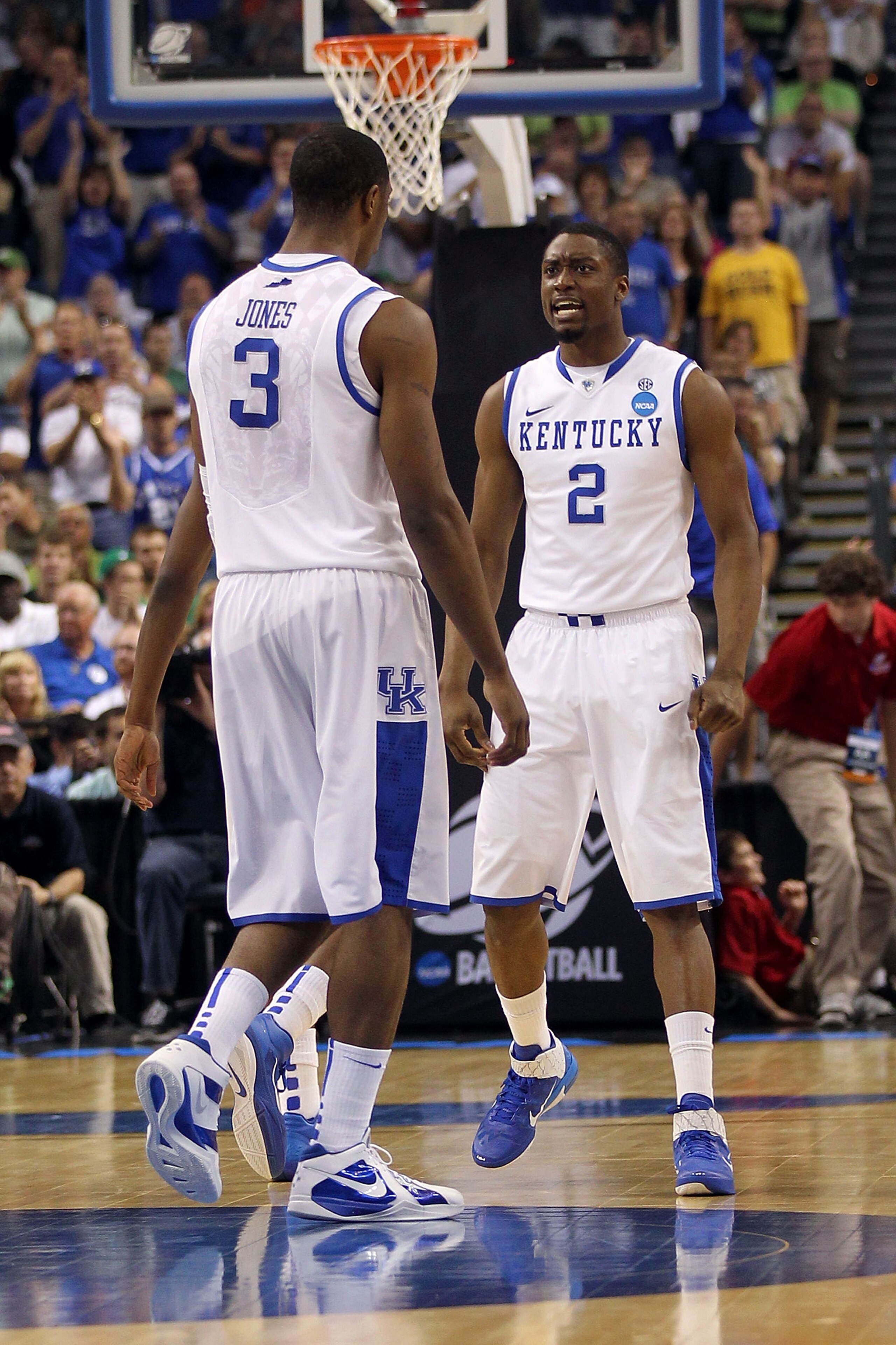 TAMPA, FL - MARCH 17:  Stacey Poole Jr. #2 and Terrence Jones #3 of the Kentucky Wildcats react against the Princeton Tigers during the second round of the 2011 NCAA men's basketball tournament at St. Pete Times Forum on March 17, 2011 in Tampa, Florida.