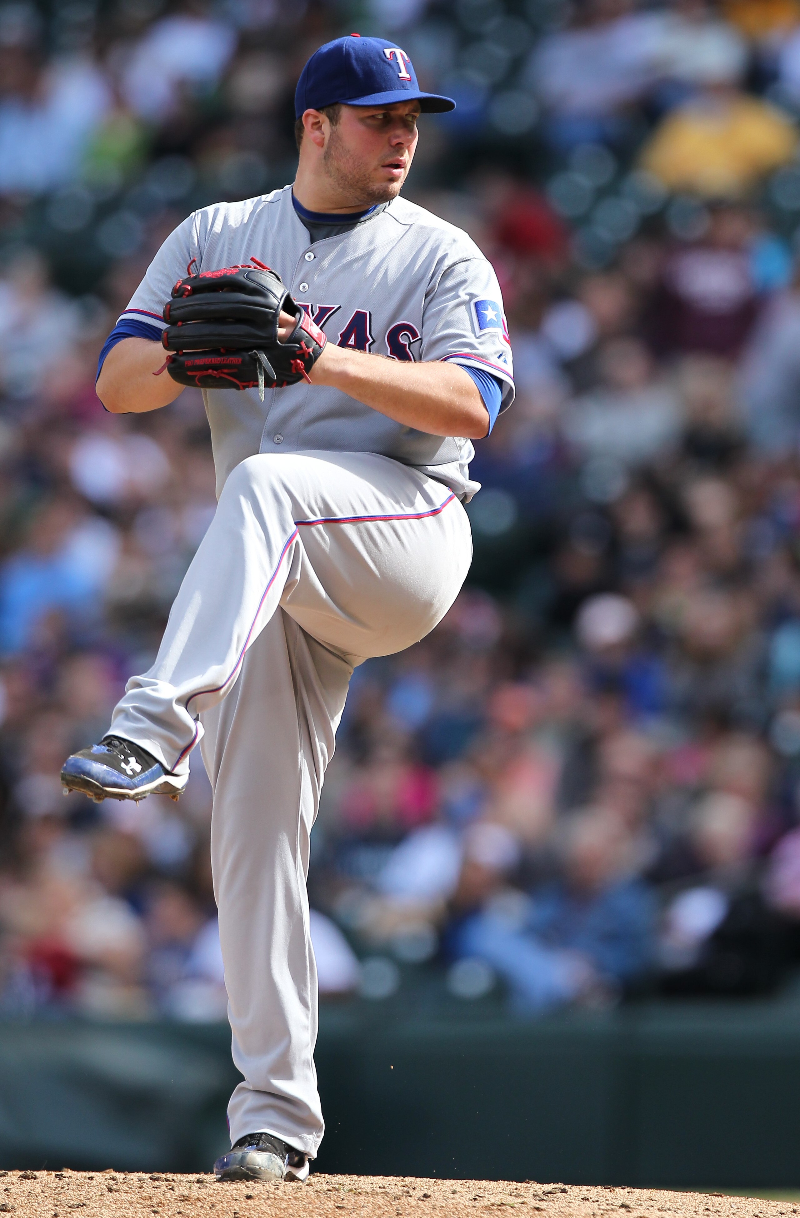 SEATTLE - SEPTEMBER 19:  Starting pitcher Tommy Hunter #35 of the Texas Rangers pitches against the Seattle Mariners at Safeco Field on September 19, 2010 in Seattle, Washington. The Mariners won 2-1. (Photo by Otto Greule Jr/Getty Images)