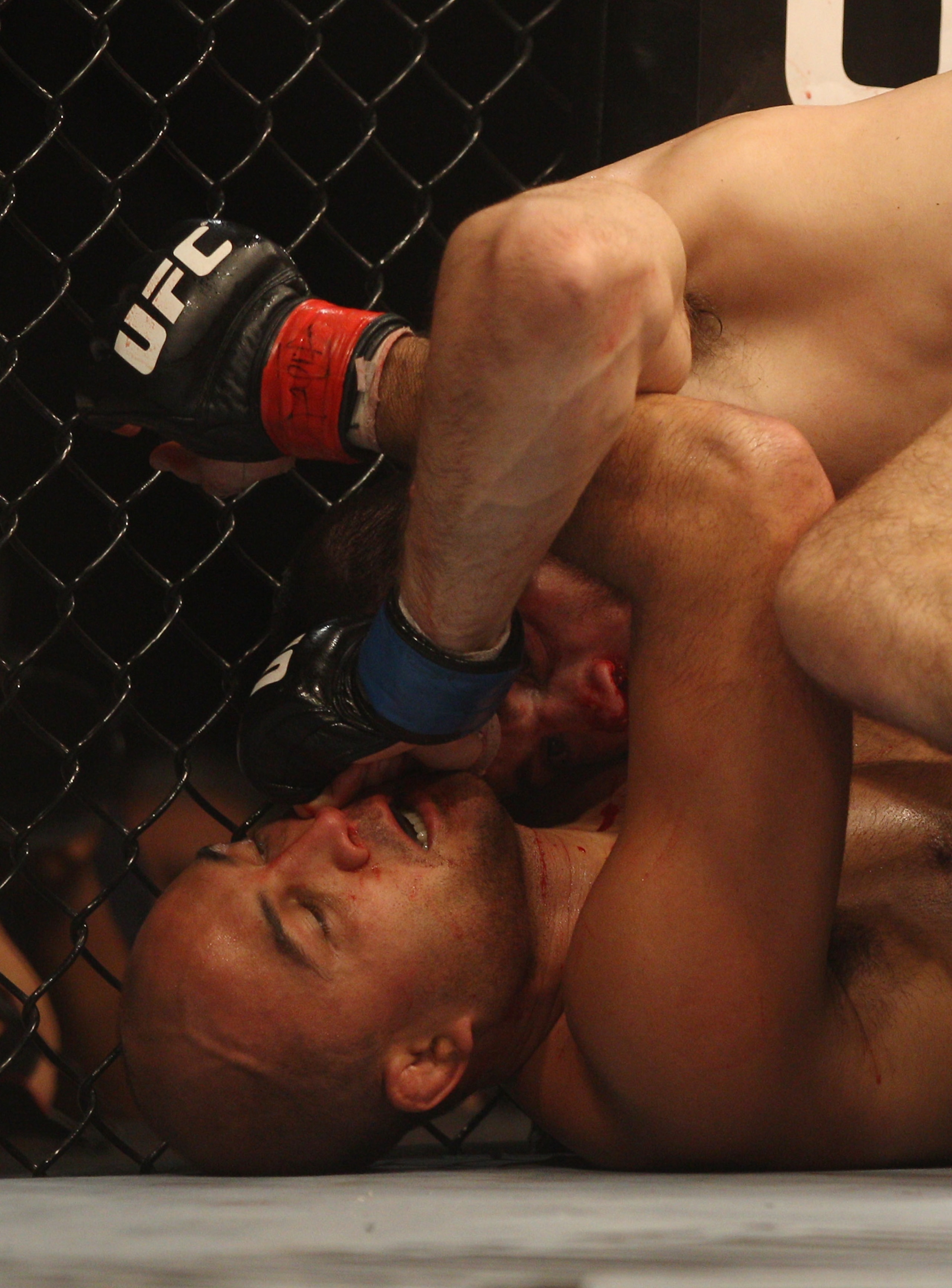 SYDNEY, AUSTRALIA - FEBRUARY 27: BJ Penn of the USA is pinned down by Jon Fitch of the USA during their welterweight bout part of UFC 127 at Acer Arena on February 27, 2011 in Sydney, Australia. (Photo by Mark Kolbe/Getty Images) SYDNEY, AUSTRALIA - FEBRUARY 27: BJ Penn of the USA is pinned down by Jon Fitch of the USA during their welterweight bout part of UFC 127 at Acer Arena on February 27, 2011 in Sydney, Australia. (Photo by Mark Kolbe/Getty Images)