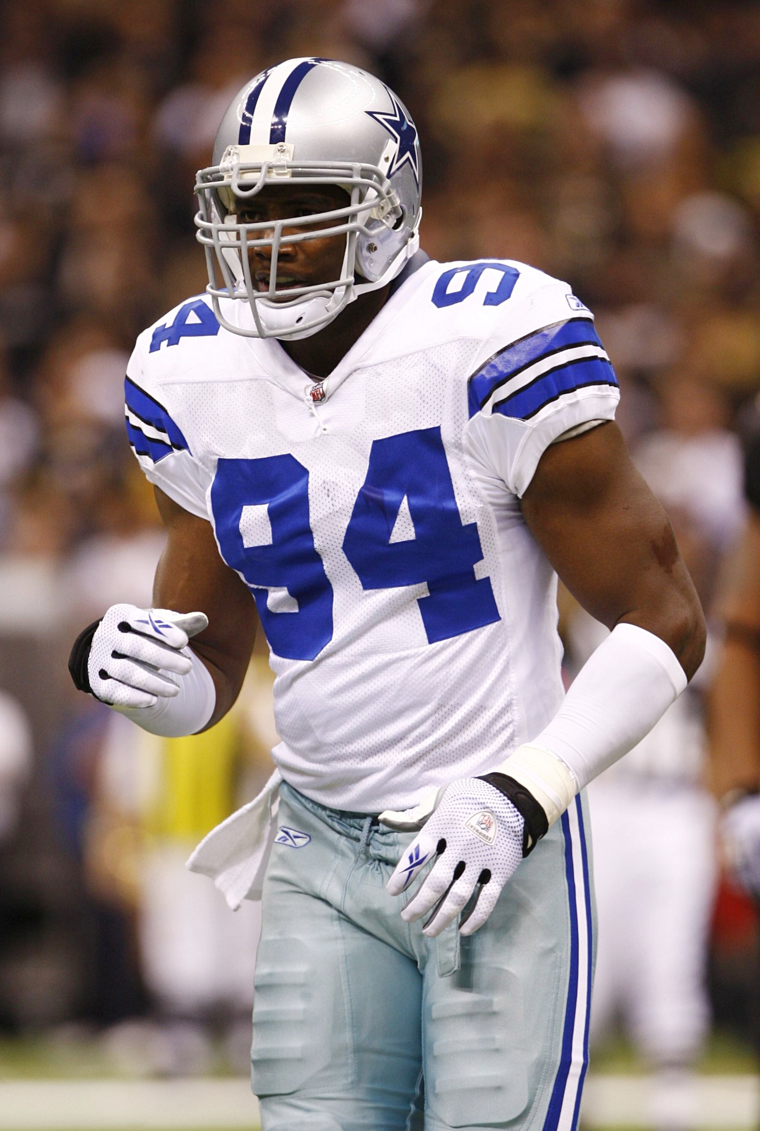 NEW ORLEANS - DECEMBER 19:  Linebacker DeMarcus Ware #94 of the Dallas Cowboys jogs on the field during their game against the New Orleans Saints at the Louisiana Superdome on December 19, 2009 in New Orleans, Louisiana. (Photo by Scott Halleran/Getty Ima