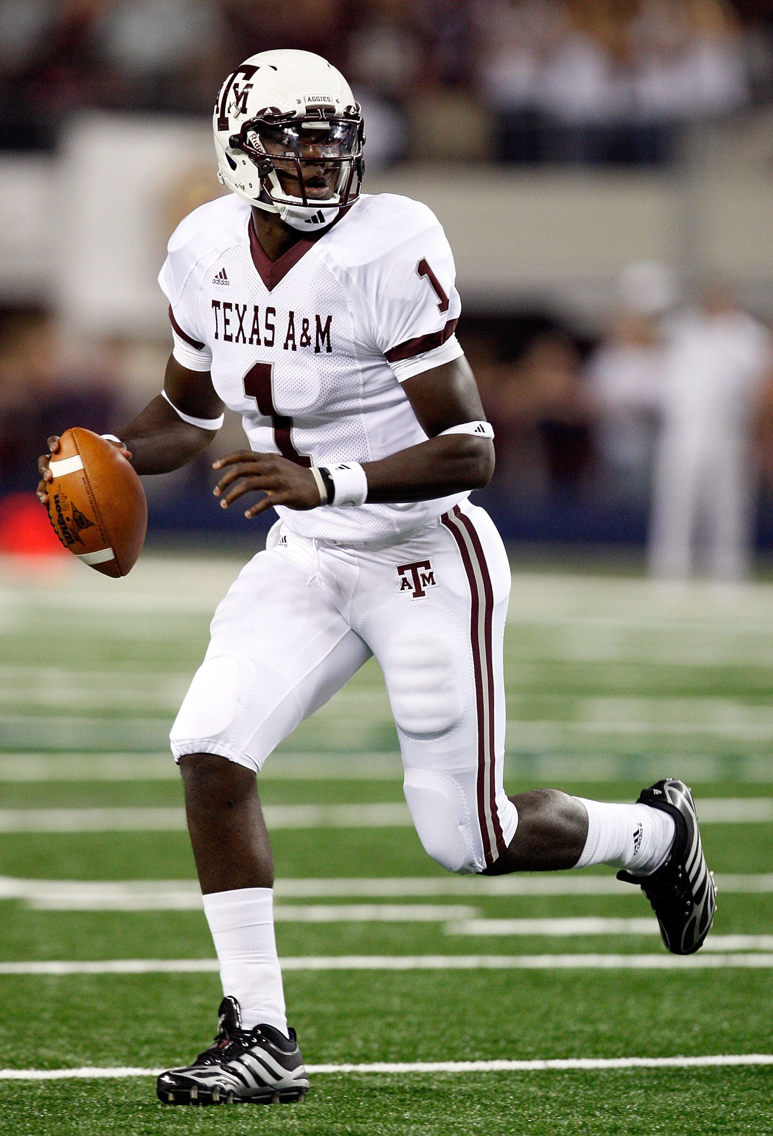 ARLINGTON, TX - OCTOBER 03:  Quarterback Jerrod Johnson #1 of the Texas A&M Aggies drops back to pass against the Arkansas Razorbacks at Dallas Cowboys Stadium on October 3, 2009 in Arlington, Texas.  (Photo by Ronald Martinez/Getty Images)