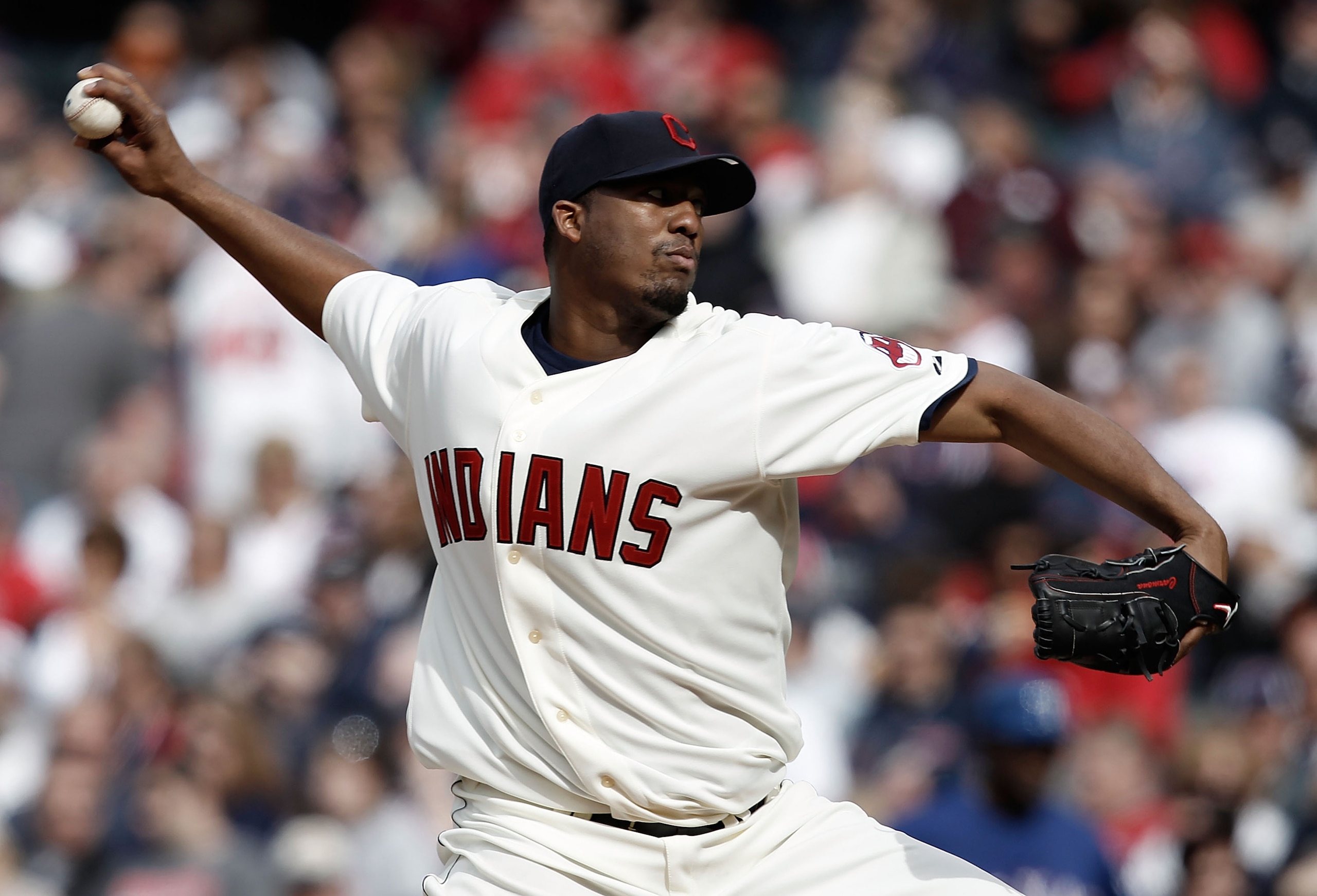 CLEVELAND, OH- APRIL 12: Fausto Carmona #55 of the Cleveland Indians pitches against the Texas Rangers during the Opening Day game on April 12, 2010 at Progressive Field in Cleveland, Ohio.  (Photo by Jared Wickerham/Getty Images)