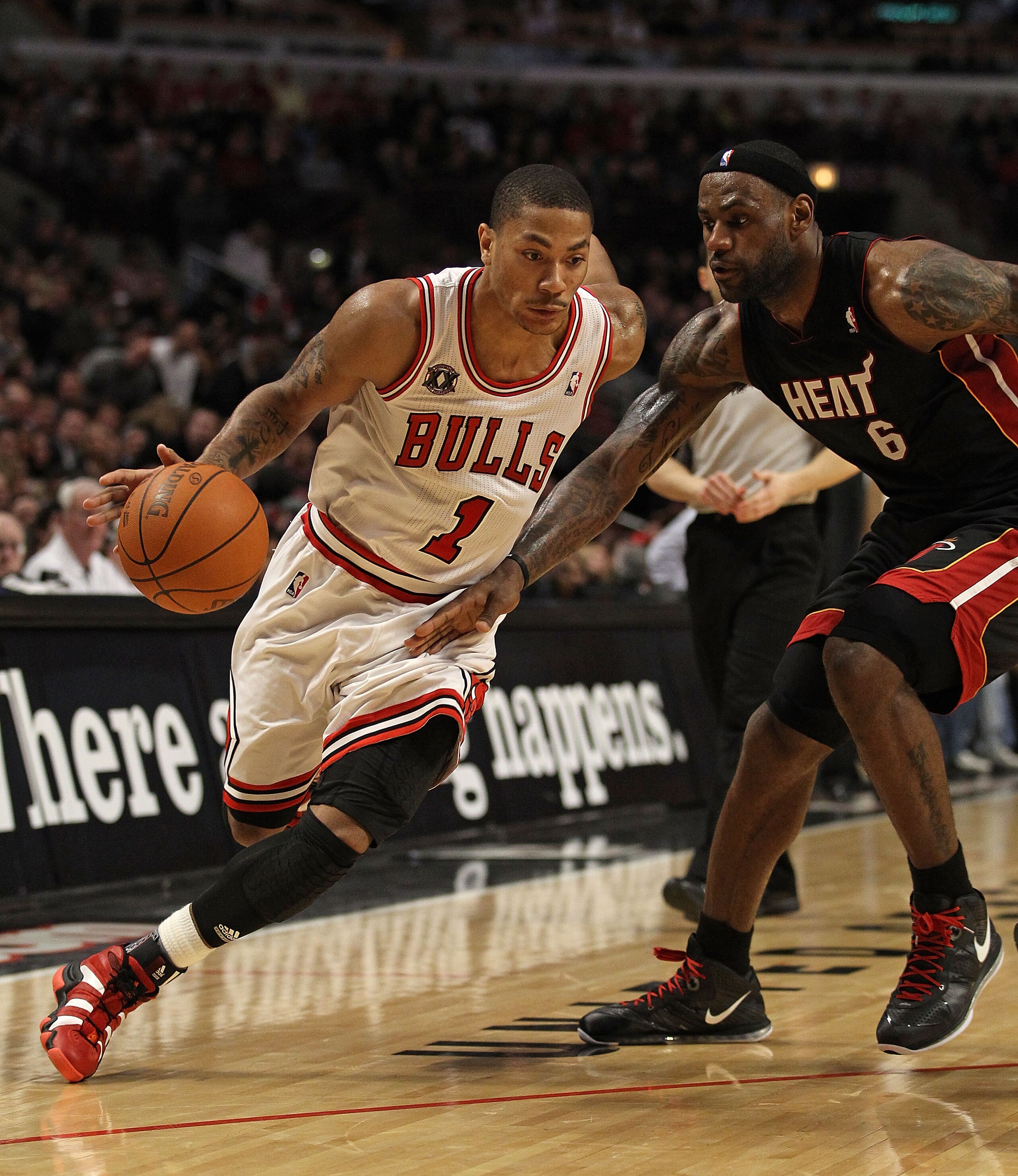 CHICAGO, IL - FEBRUARY 24: Derrick Rose #1 of the Chicago Bulls drives against LeBron James #6 of the Miami Heat at the United Center on February 24, 2011 in Chicago, Illinois. The Bulls defeated the Heat 93-89. NOTE TO USER: User expressly acknowledges a CHICAGO, IL - FEBRUARY 24: Derrick Rose #1 of the Chicago Bulls drives against LeBron James #6 of the Miami Heat at the United Center on February 24, 2011 in Chicago, Illinois. The Bulls defeated the Heat 93-89. NOTE TO USER: User expressly acknowledges a