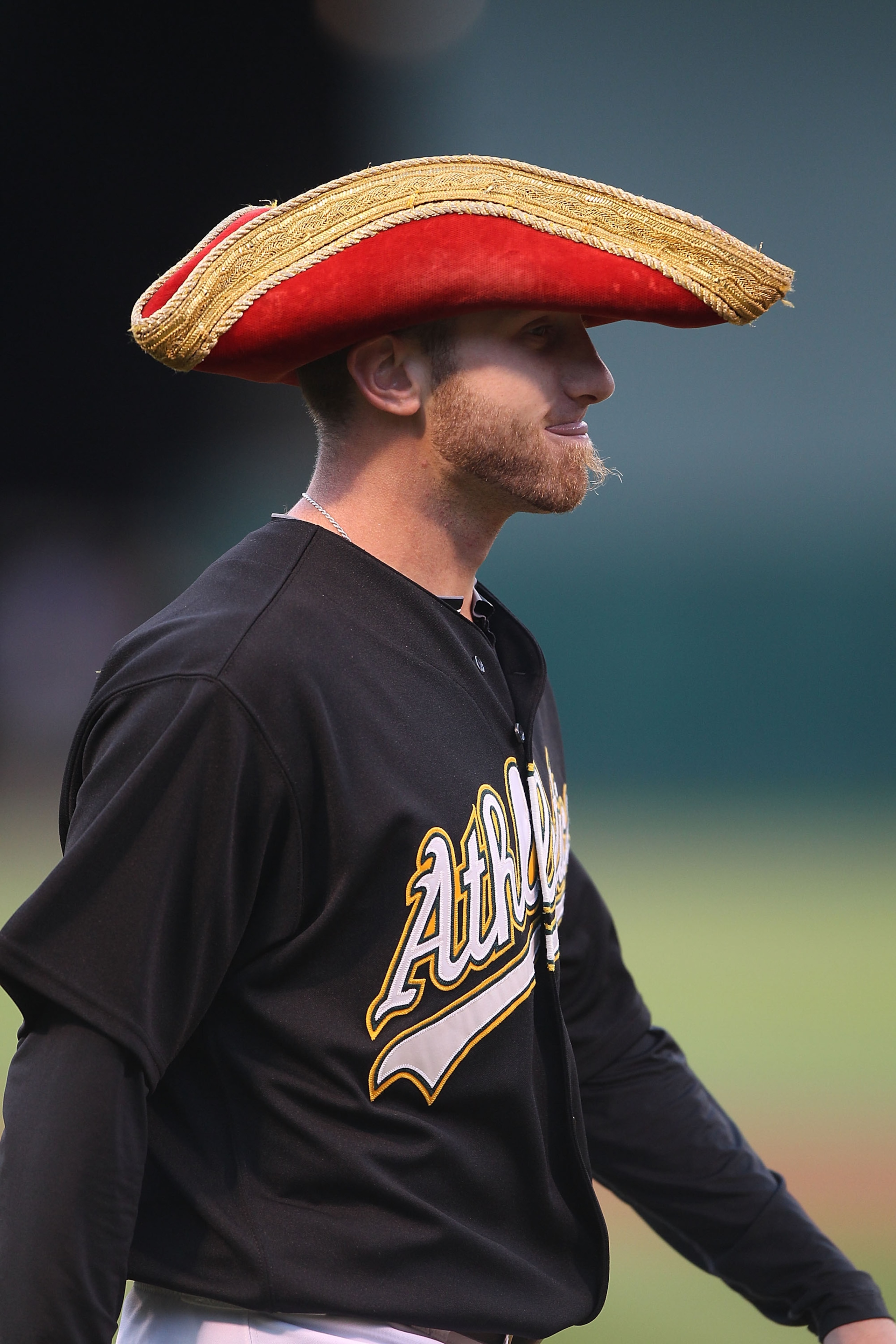 OAKLAND, CA - SEPTEMBER 08: Dallas Braden #51 of the Oakland Athletics poses with a Captain Morgan hat before their game against the Seattle Mariners during a Major League Baseball game at the Oakland-Alameda County Coliseum on September 8, 2010 in Oakla OAKLAND, CA - SEPTEMBER 08: Dallas Braden #51 of the Oakland Athletics poses with a Captain Morgan hat before their game against the Seattle Mariners during a Major League Baseball game at the Oakland-Alameda County Coliseum on September 8, 2010 in Oakla