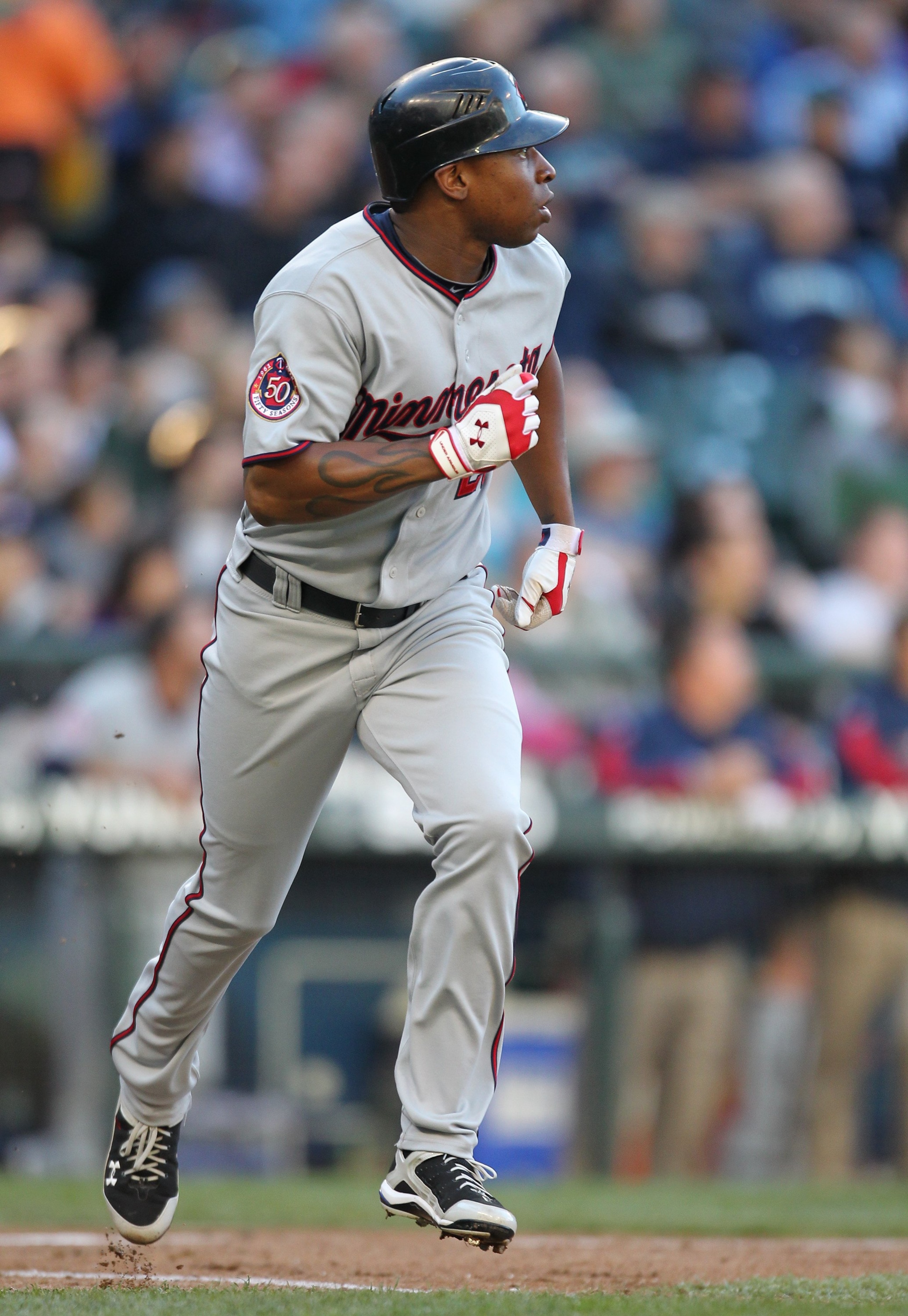 SEATTLE - MAY 31:  Delmon Young #21 of the Minnesota Twins watches his two run home run in the second against the Seattle Mariners at Safeco Field on May 31, 2010 in Seattle, Washington. (Photo by Otto Greule Jr/Getty Images)