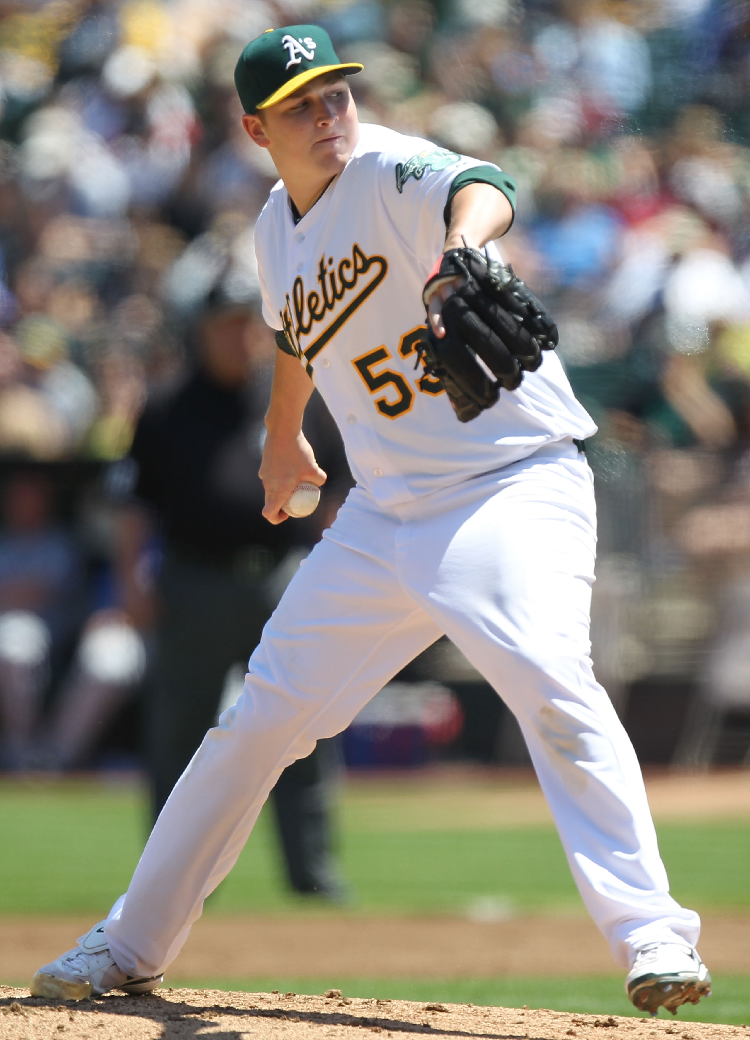 OAKLAND, CA - AUGUST 08:  Trevor Cahill #53 of the Oakland Athletics pitches against the Texas Rangers during an MLB game at the Oakland-Alameda County Coliseum on August 8, 2010 in Oakland, California.  (Photo by Jed Jacobsohn/Getty Images)