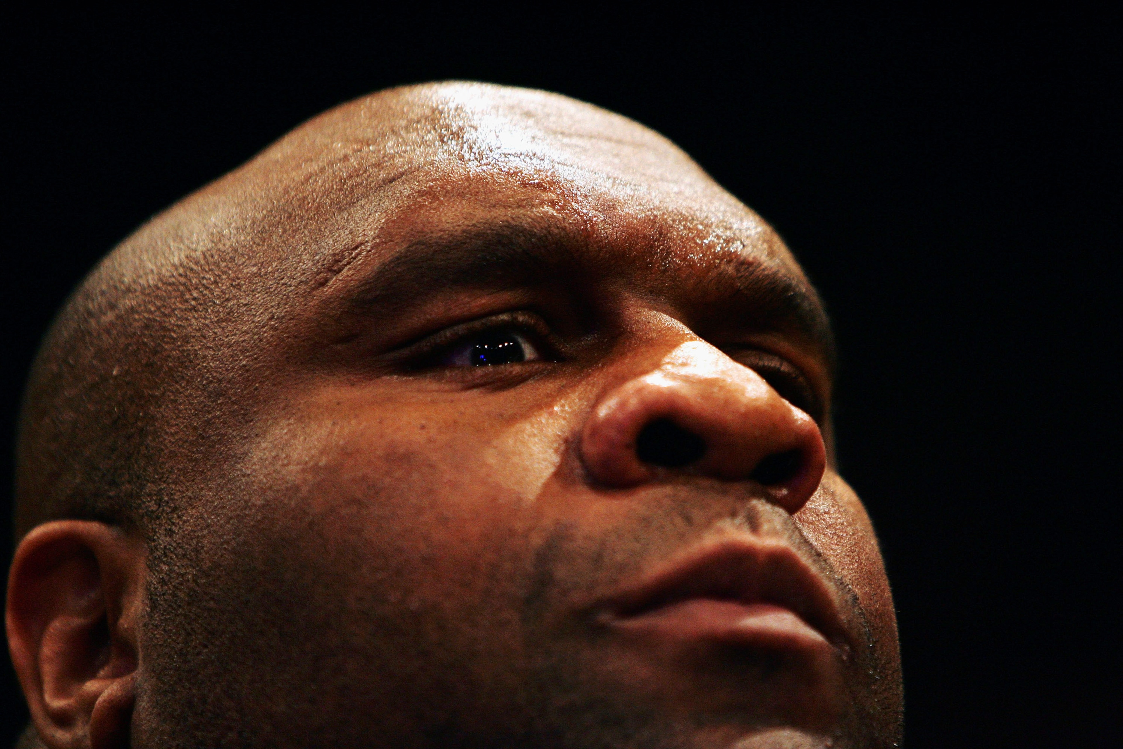 LONDON - FEBRUARY 10: Robert Malcolm Sapp also known as Bob The Beast Sapp eyes off a potential challenger during the Cage Rage Championship 20 Born to fight event at Wembley Arena on February 10, 2007 in London, England. Cage Fighting also known as MMA,