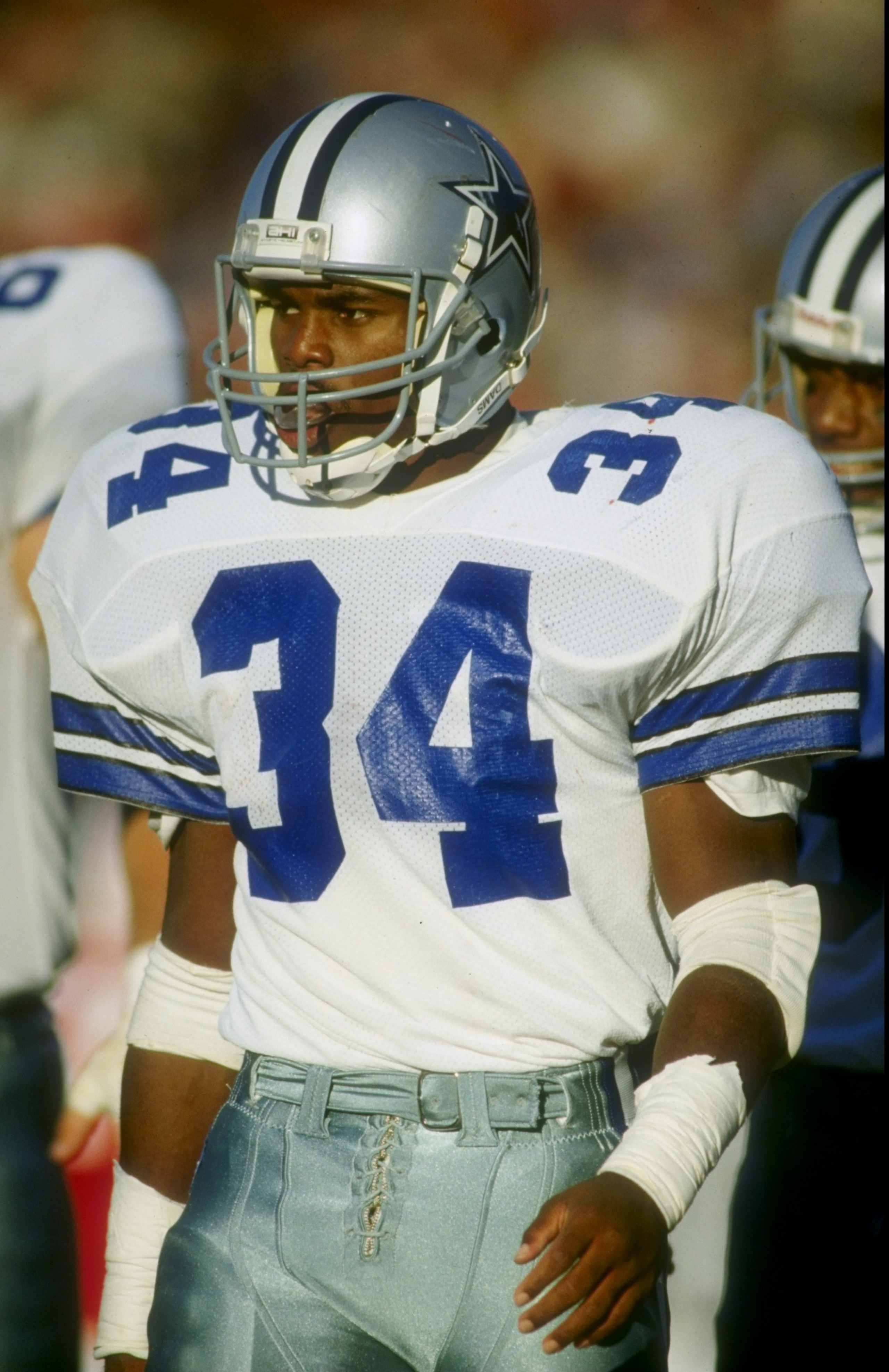 15 Nov 1987: Running back Herschel Walker of the Dallas Cowboys looks on during a game against the New England Patriots at Foxboro Stadium in Foxboro, Massachusetts. The Cowboys defeated the Patriots 23-17.