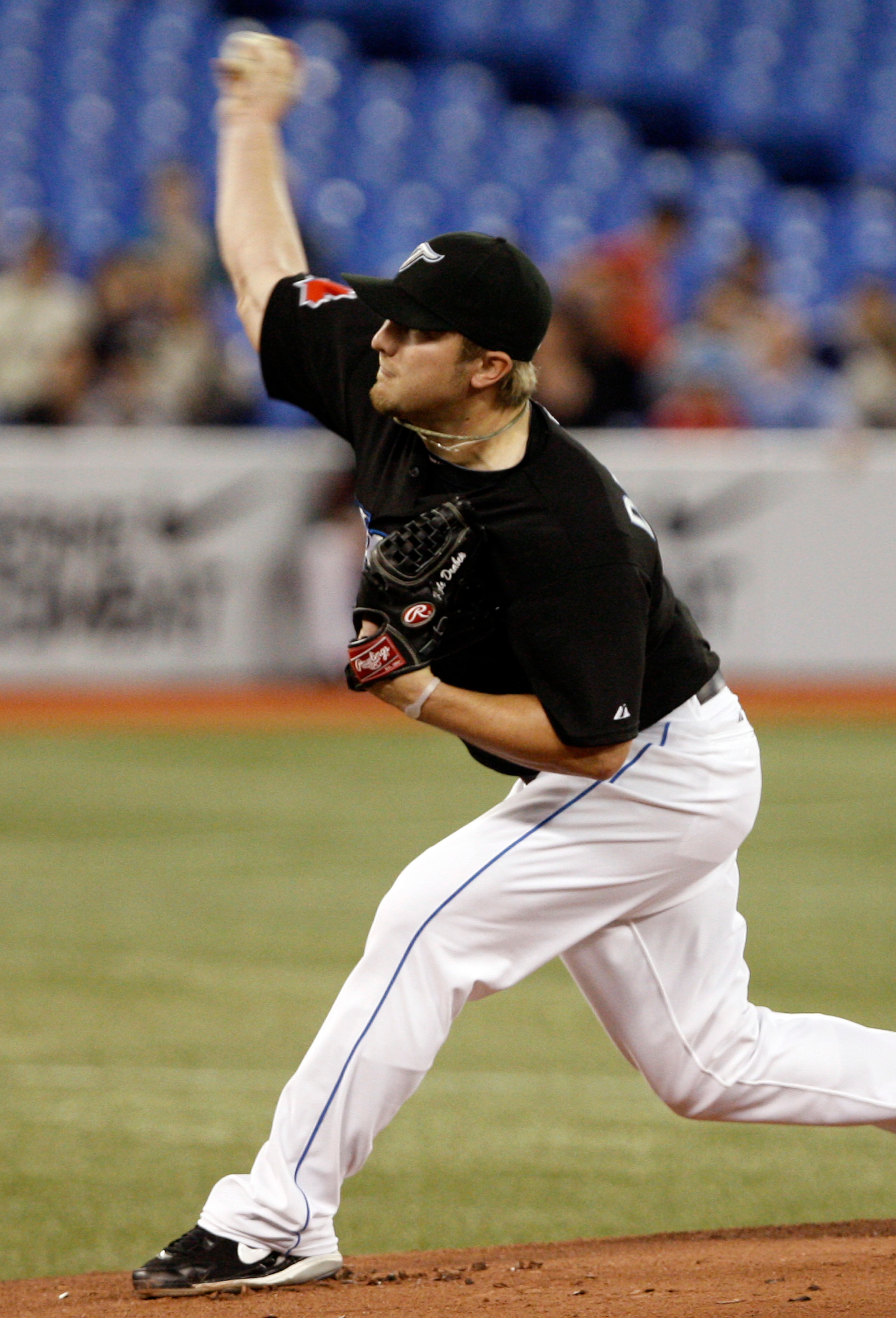 TORONTO, ON - SEPTEMBER 28: Kyle Drabek #4 of the Toronto Blue Jays throws agianst the New York Yankees during an MLB game at the Rogers Centre September 28, 2010 in Toronto, Ontario, Canada. (Photo by Abelimages/Getty Images)
