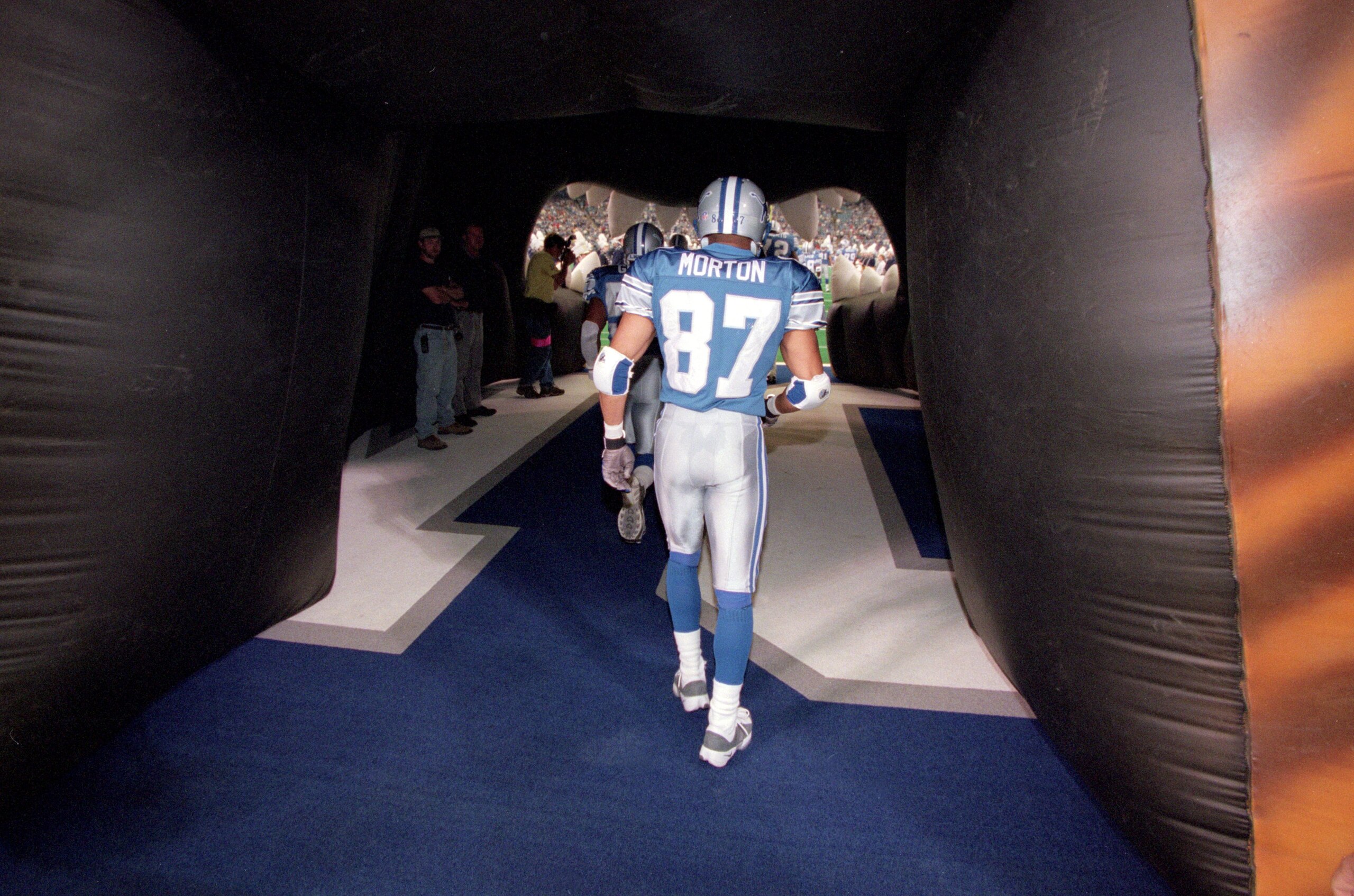 1 Oct 2000: Johnnie Morton #87 of the Detroit Lions walks down the tunnel onto the field before a game against the Minnesota Vikings at the Silverdome in Pontiac, Michigan.  The Vikings defeated the Lions 31-24.Mandatory Credit: Tom Pidgeon  /Allsport