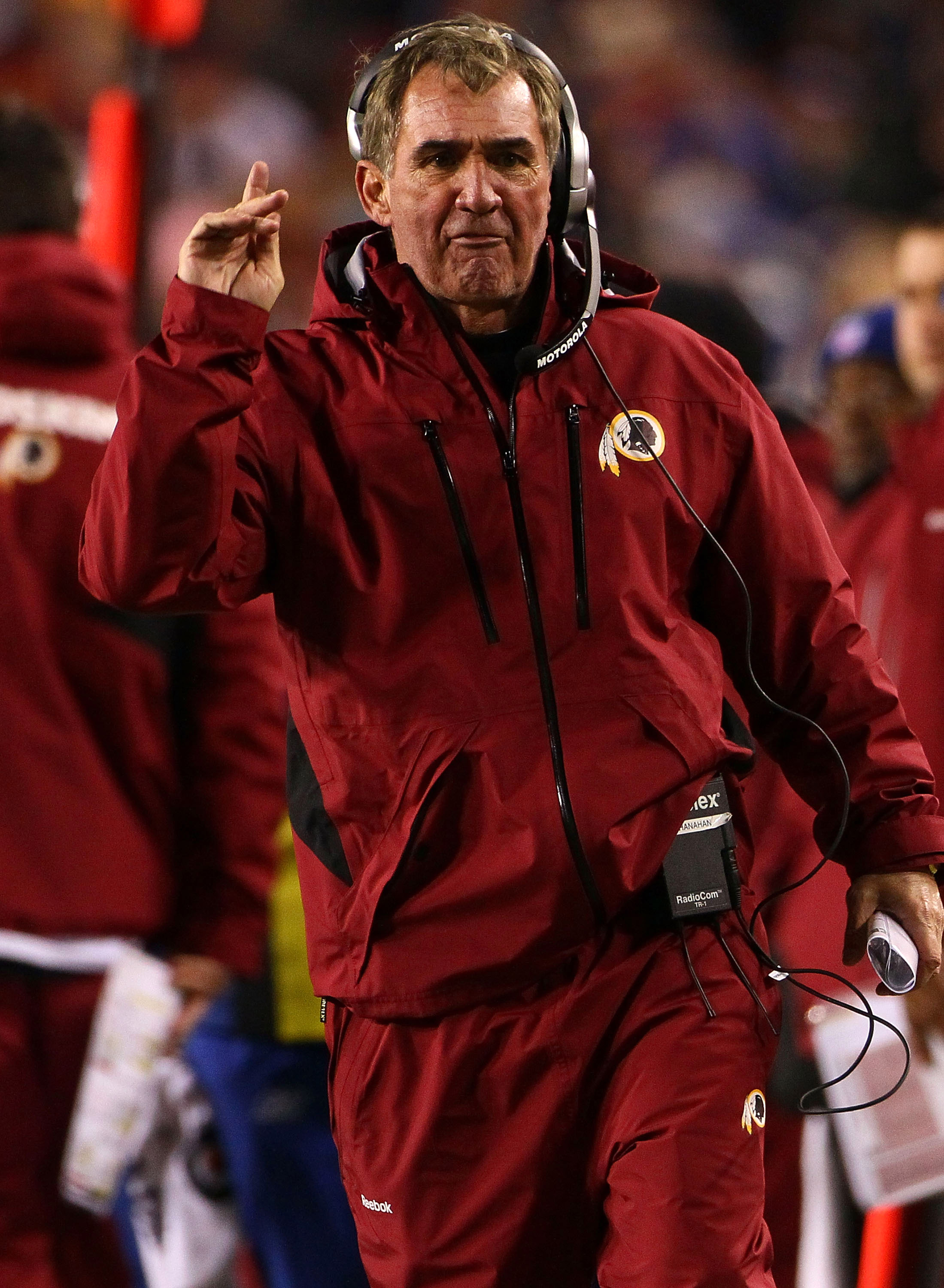 LANDOVER, MD - JANUARY 02:  Washington Redskins head coach Mike Shanahan makes a point with a referee in the fourth quarter of a game against the New York Giants at FedEx Field on January 2, 2011 in Landover, Maryland. The Giants won the game 17-14.  (Pho