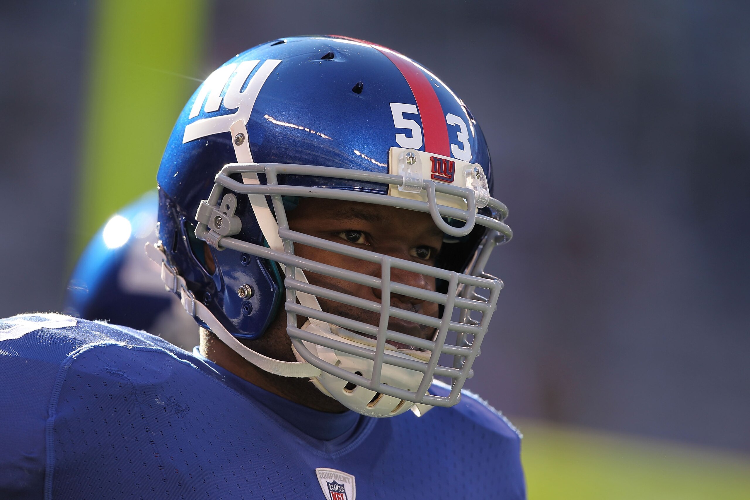 EAST RUTHERFORD, NJ - NOVEMBER 28: Keith Bulluck #53 of the New York Giants looks on before the game against the Jacksonville Jaguars during their game on November 28, 2010 at The New Meadowlands Stadium in East Rutherford, New Jersey.  (Photo by Al Bello