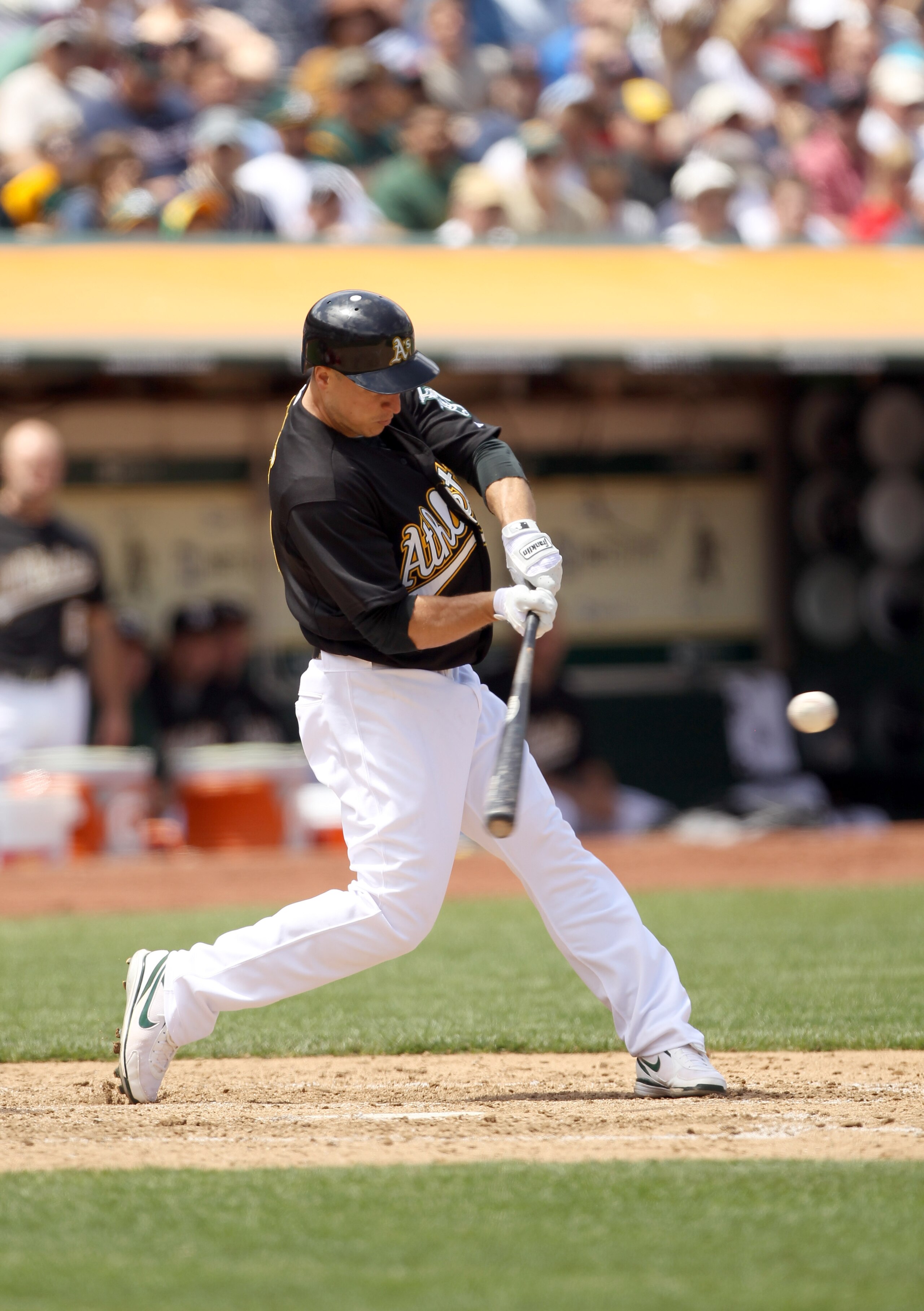 OAKLAND, CA - JULY 21:  Mark Ellis #14 of the Oakland Athletics bats against the Boston Red Sox at the Oakland-Alameda County Coliseum on July 21, 2010 in Oakland, California.  (Photo by Ezra Shaw/Getty Images)