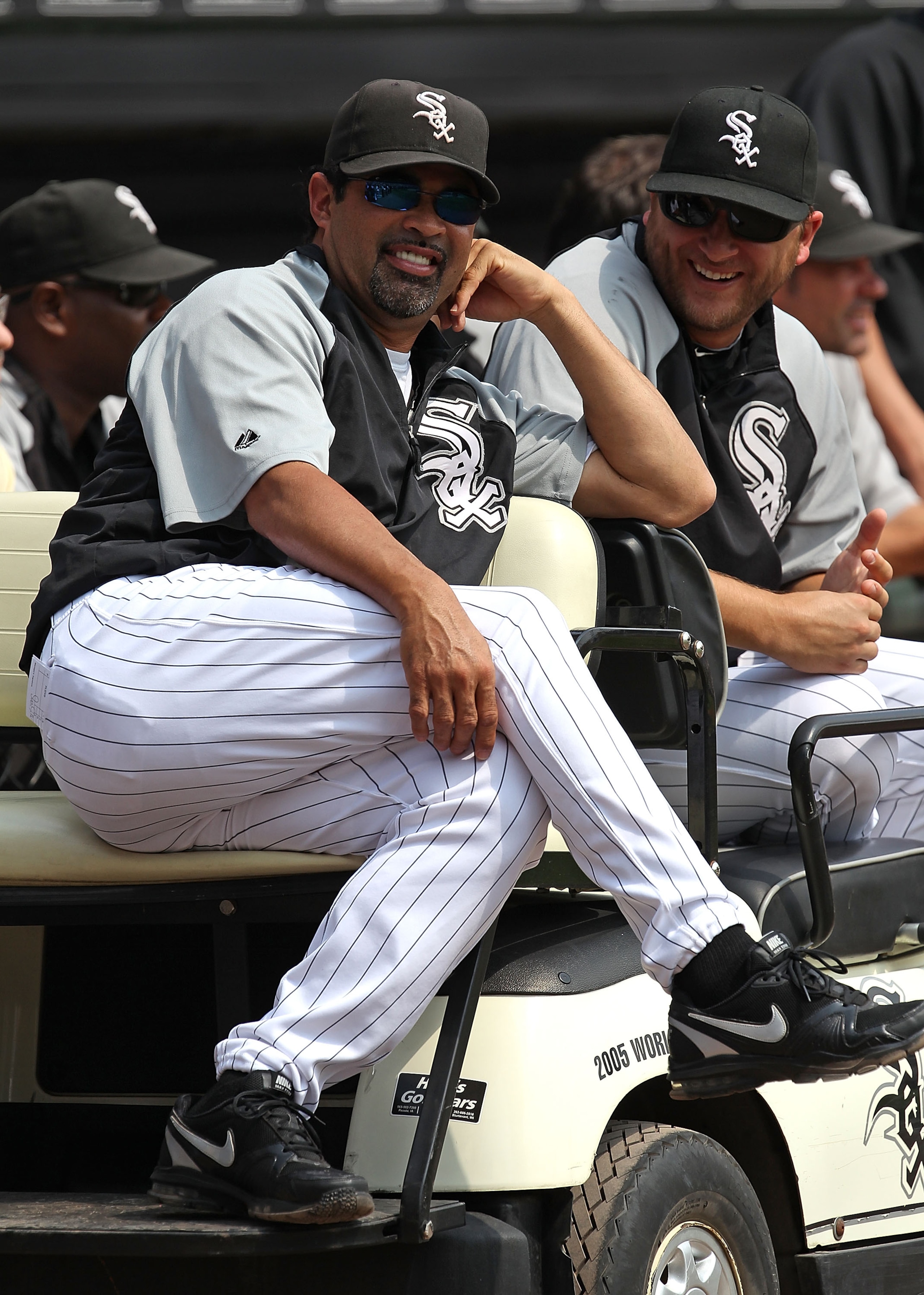 CHICAGO - AUGUST 29: Manager Ozzie Guillen #13 (L) and Mark Buehrle #56 of the Chicago White Sox enjoy a ceremony retiring former player Frank Thomas' number 35 before a game against the New York Yankees at U.S. Cellular Field on August 29, 2010 in Chicag CHICAGO - AUGUST 29: Manager Ozzie Guillen #13 (L) and Mark Buehrle #56 of the Chicago White Sox enjoy a ceremony retiring former player Frank Thomas' number 35 before a game against the New York Yankees at U.S. Cellular Field on August 29, 2010 in Chicag