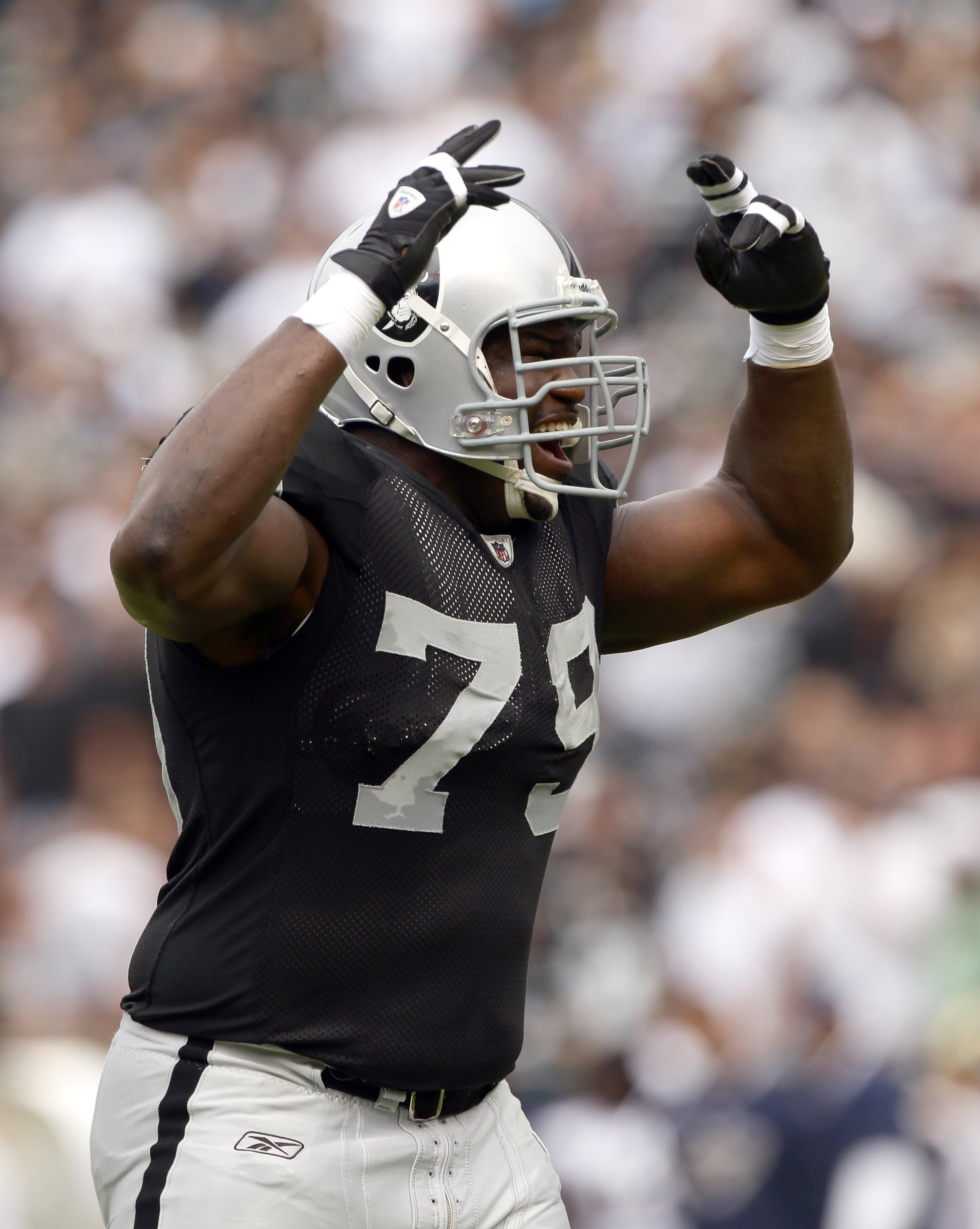 OAKLAND, CA - SEPTEMBER 19:  John Henderson #79 of the Oakland Raiders in action during their game against the St. Louis Rams at the Oakland-Alameda County Coliseum on September 19, 2010 in Oakland, California.  (Photo by Ezra Shaw/Getty Images)
