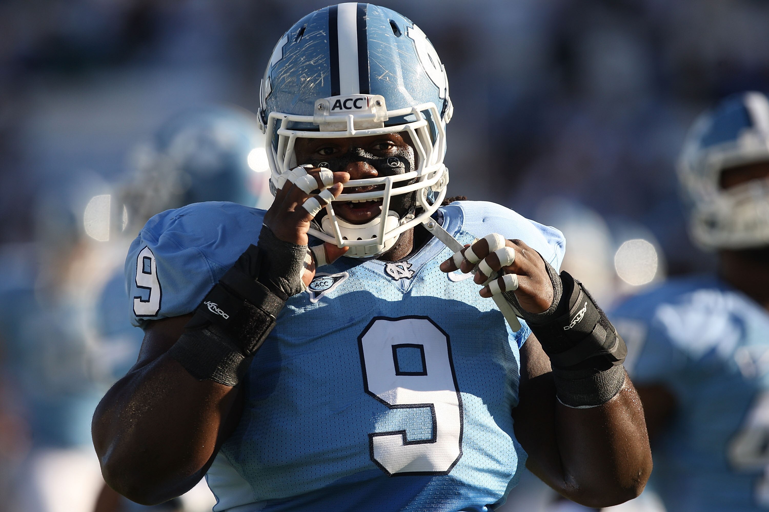 CHAPEL HILL, NC - NOVEMBER 07:  Marvin Austin #9 of the North Carolina Tar Heels watches on against the Duke Blue Devils during their game at Kenan Stadium on November 7, 2009 in Chapel Hill, North Carolina.  (Photo by Streeter Lecka/Getty Images)