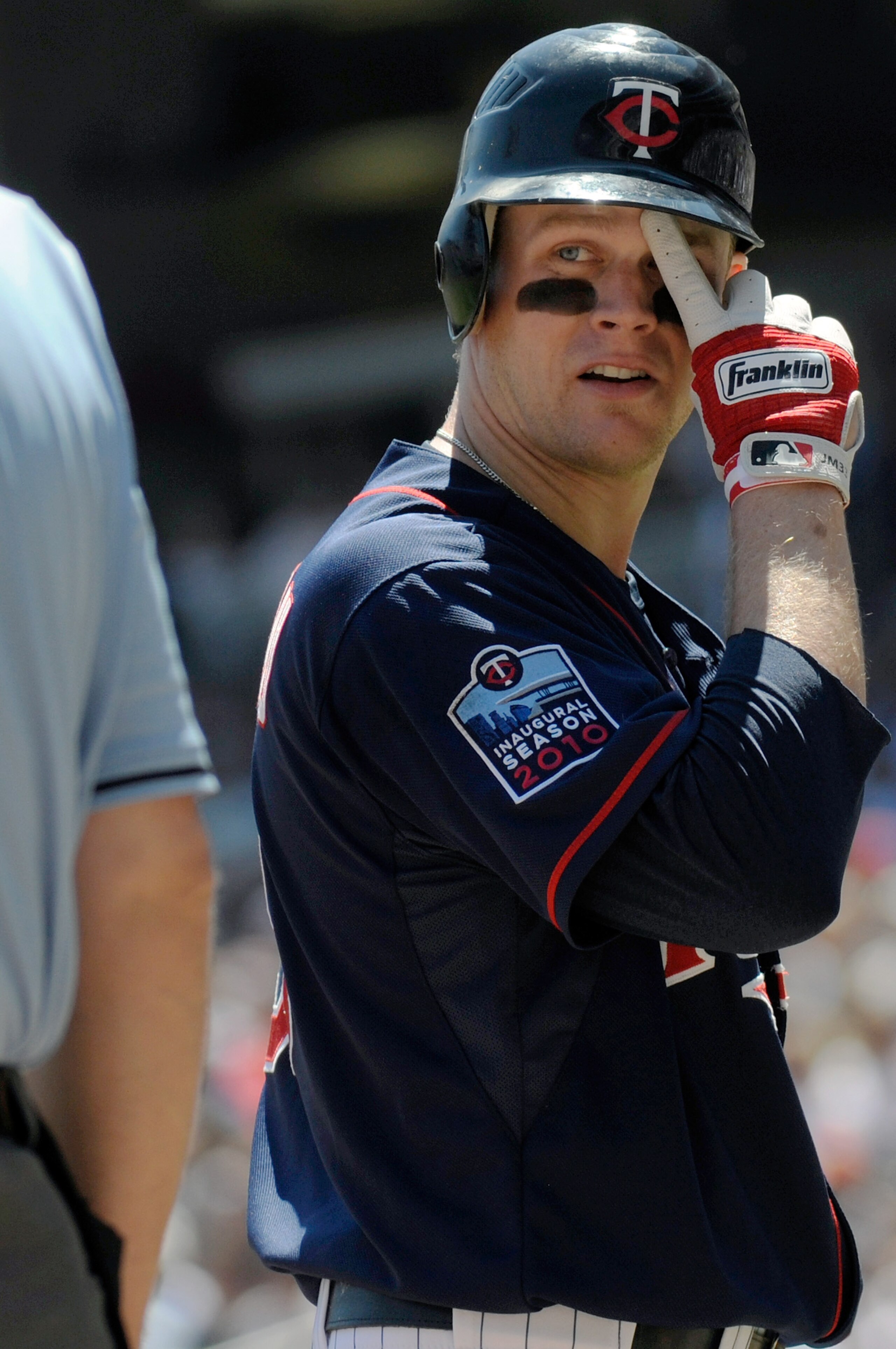 MINNEAPOLIS, MN - JUNE 30: Justin Morneau #33 of the Minnesota Twins looks at home plate umpire Bill Welke #52 after being called out on strikes in the second inning against the Detroit Tigers during their game on June 30, 2010 at Target Field in Minneapo MINNEAPOLIS, MN - JUNE 30: Justin Morneau #33 of the Minnesota Twins looks at home plate umpire Bill Welke #52 after being called out on strikes in the second inning against the Detroit Tigers during their game on June 30, 2010 at Target Field in Minneapo