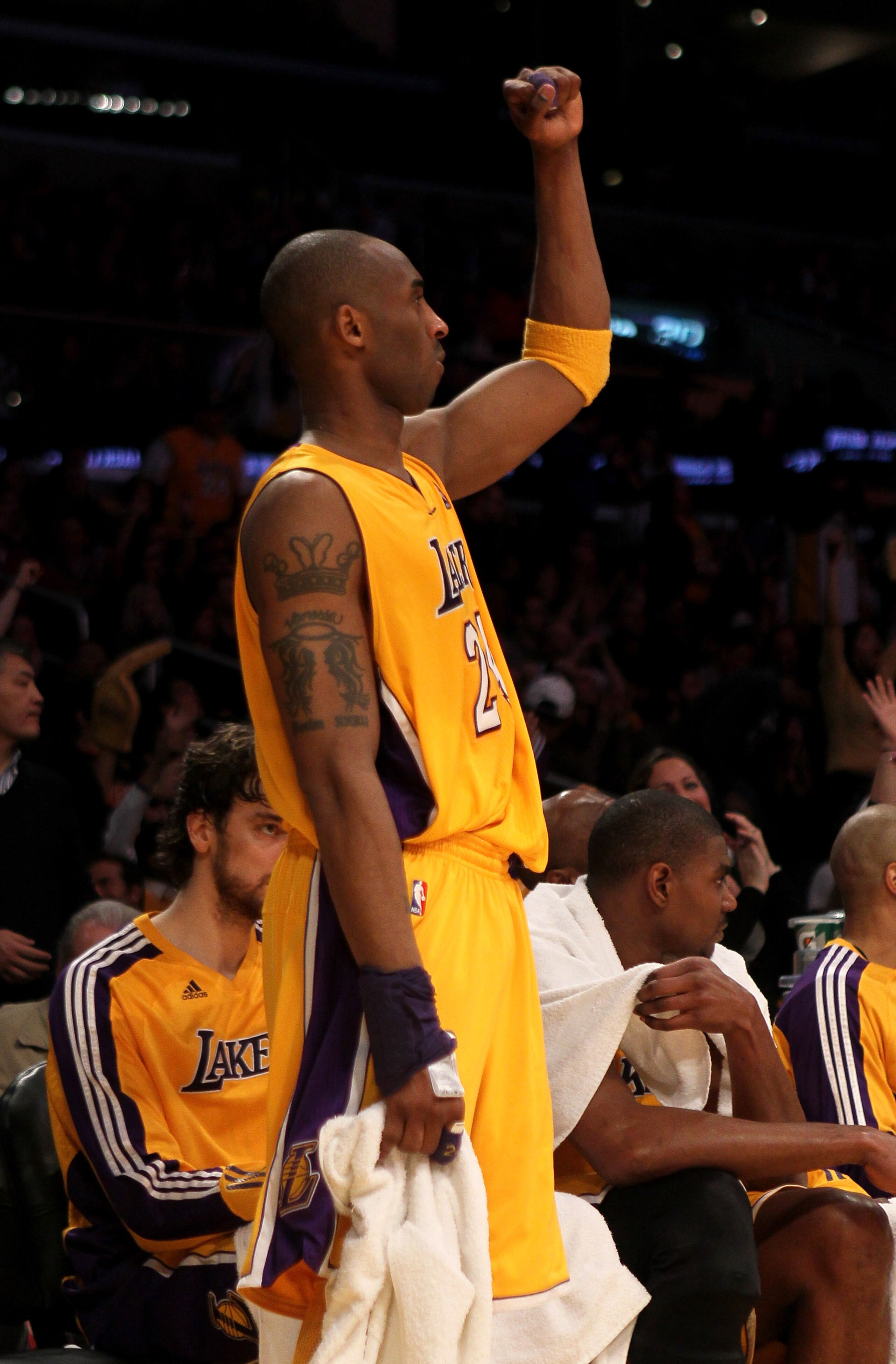 LOS ANGELES, CA - FEBRUARY 25: Kobe Brynat #24 of the Los Angeles Lakers celebrates from the bench during the game with the Los Angeles Clippers at Staples Center on February 25, 2011 in Los Angeles, California. The Lakers won 108-95. NOTE TO USER: User LOS ANGELES, CA - FEBRUARY 25: Kobe Brynat #24 of the Los Angeles Lakers celebrates from the bench during the game with the Los Angeles Clippers at Staples Center on February 25, 2011 in Los Angeles, California. The Lakers won 108-95. NOTE TO USER: User
