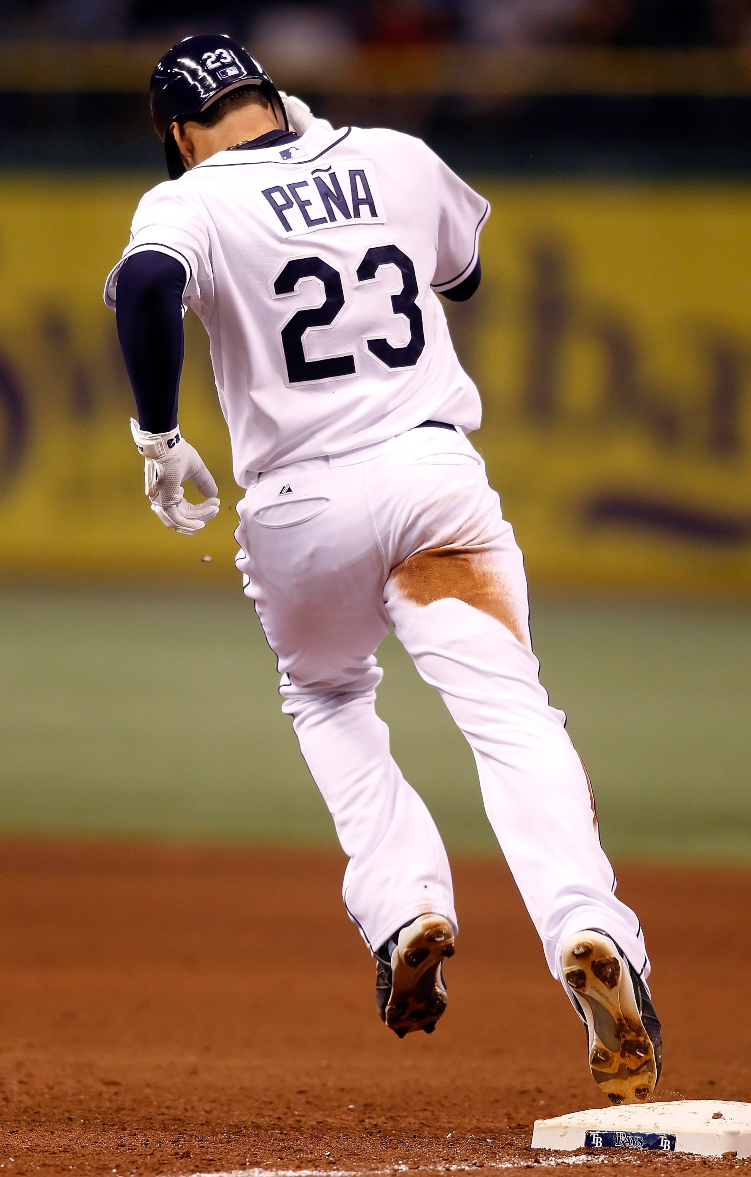 ST. PETERSBURG, FL - SEPTEMBER 28:  Infielder Carlos Pena #23 of the Tampa Bay Rays rounds the bases after his home run against the Baltimore Orioles during the game at Tropicana Field on September 28, 2010 in St. Petersburg, Florida.  (Photo by J. Meric/