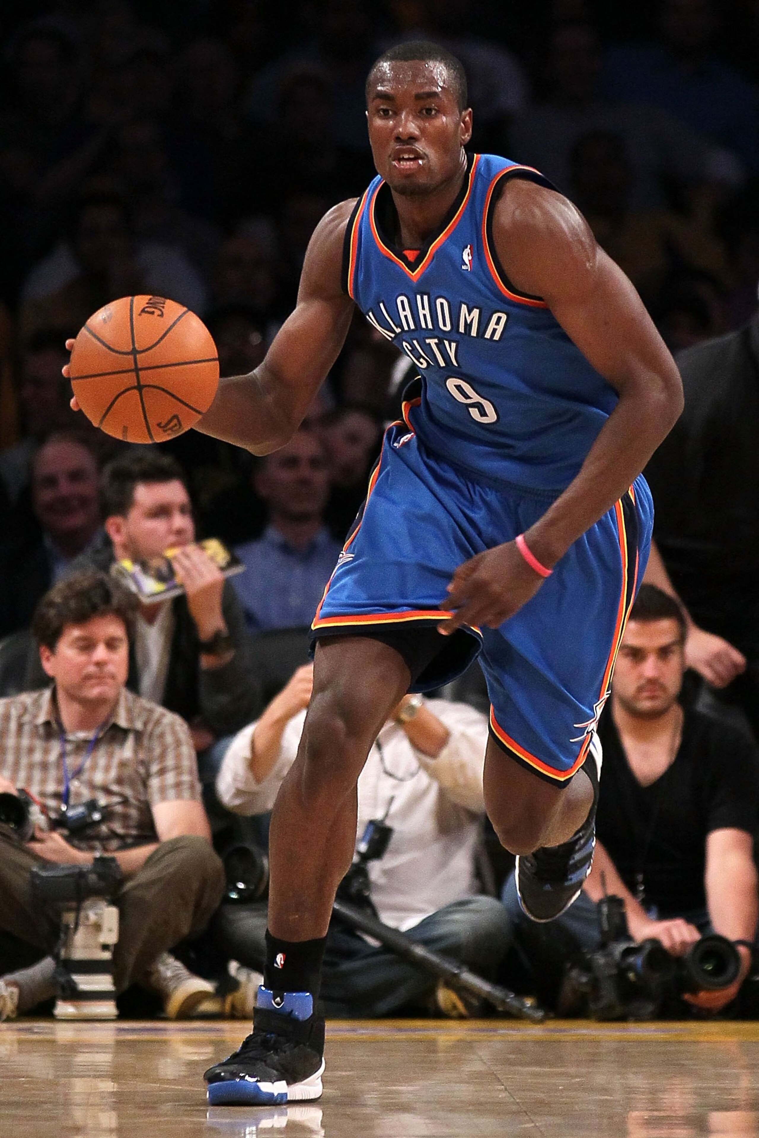 LOS ANGELES, CA - APRIL 27:  Serge Ibaka #9 of the Oklahoma City Thunder moves the ball while taking on the Los Angeles Lakers during Game Five of the Western Conference Quarterfinals of the 2010 NBA Playoffs at Staples Center on April 27, 2010 in Los Ang