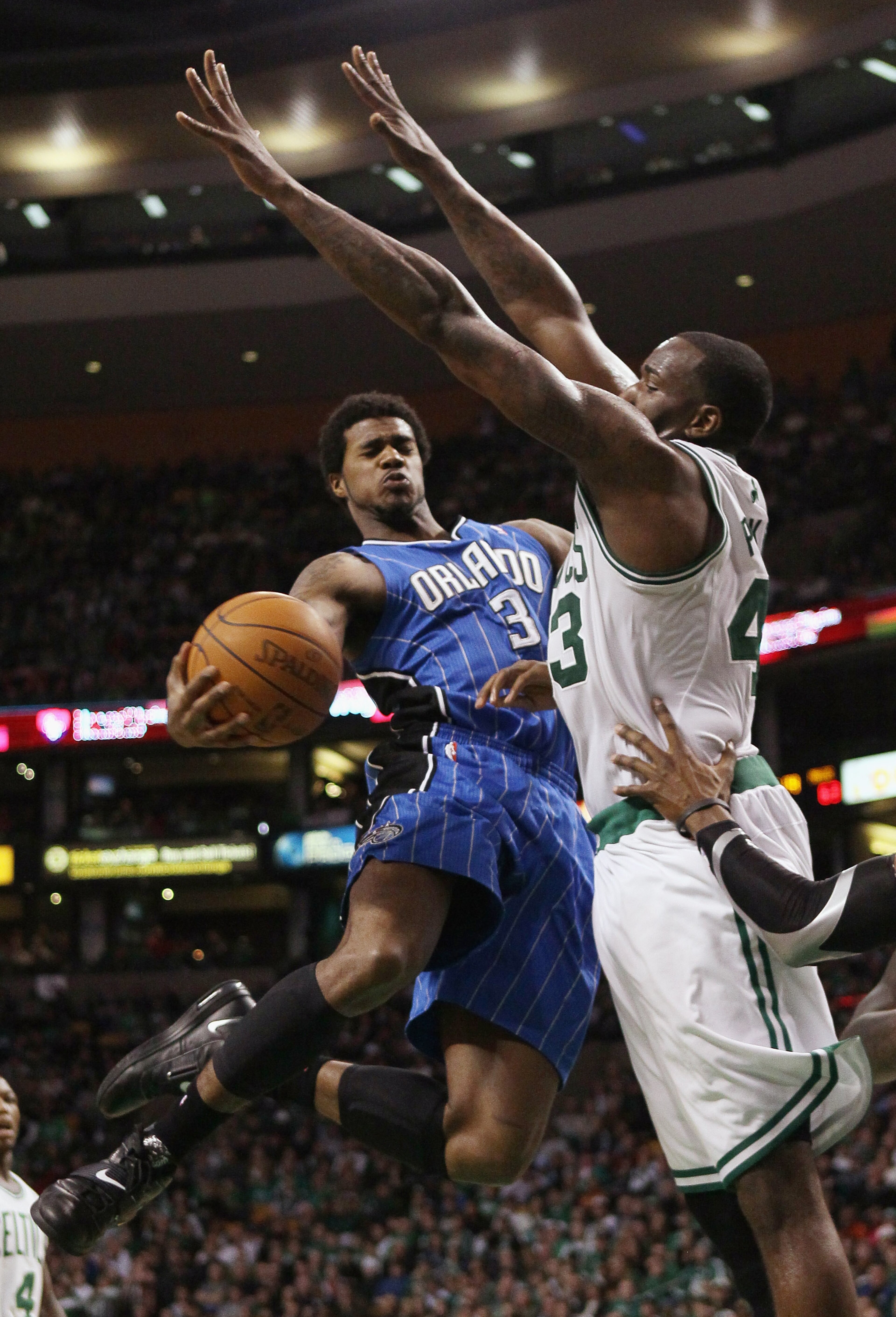 BOSTON, MA - FEBRUARY 06: Earl Clark #3 of the Orlando Magic tries to get around Kendrick Perkins #43 of the Boston Celtics on February 6, 2011 at the TD Garden in Boston, Massachusetts. The Celtics defeated the Magic 91-80. NOTE TO USER: User expressly BOSTON, MA - FEBRUARY 06: Earl Clark #3 of the Orlando Magic tries to get around Kendrick Perkins #43 of the Boston Celtics on February 6, 2011 at the TD Garden in Boston, Massachusetts. The Celtics defeated the Magic 91-80. NOTE TO USER: User expressly