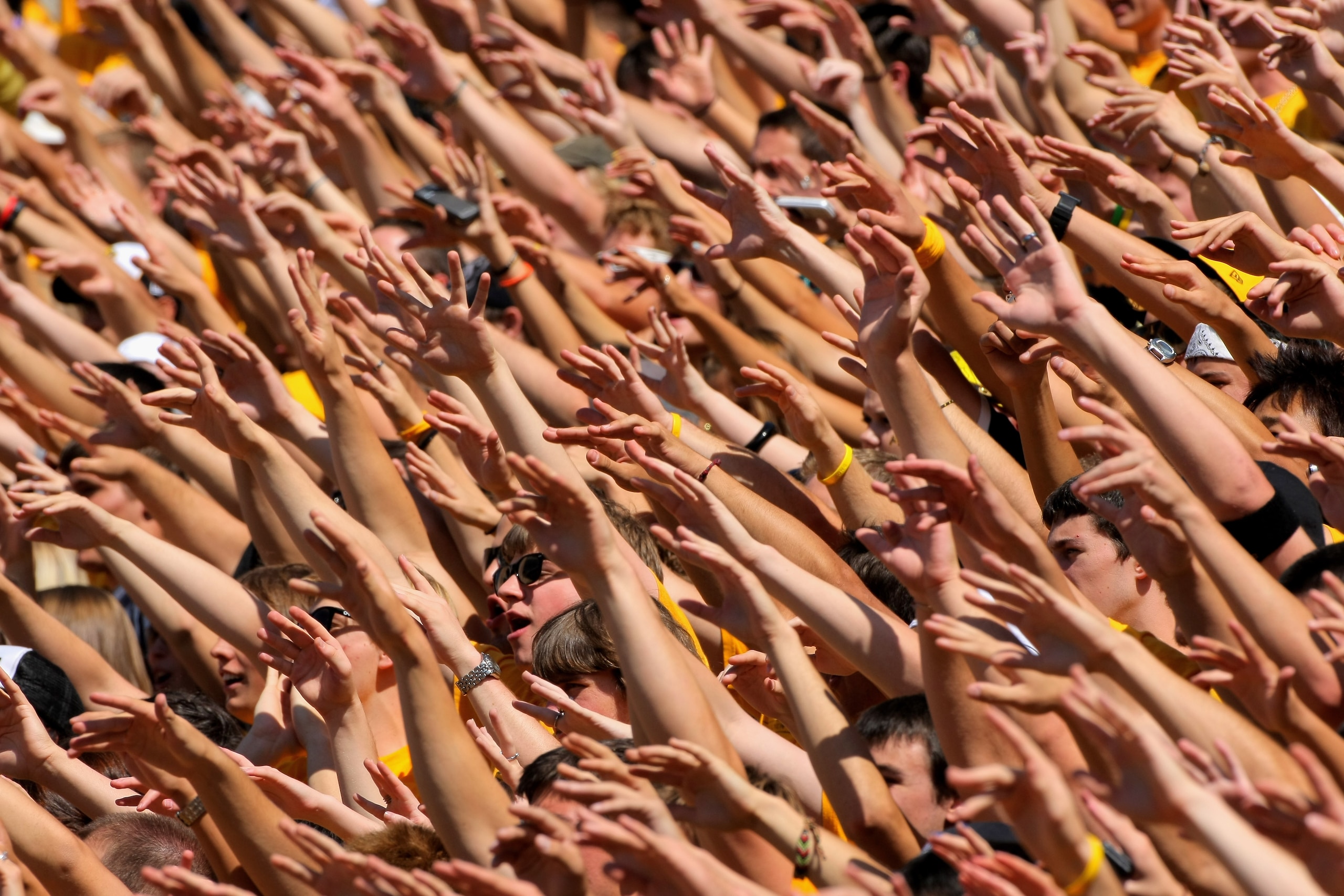BOULDER, CO - SEPTEMBER 19:  Fans in the student section of the Colorado Buffaloes wave on the opening kick off against the Wyoming Cowboys at Folsom Field on September 19, 2009 in Boulder, Colorado.  (Photo by Doug Pensinger/Getty Images)