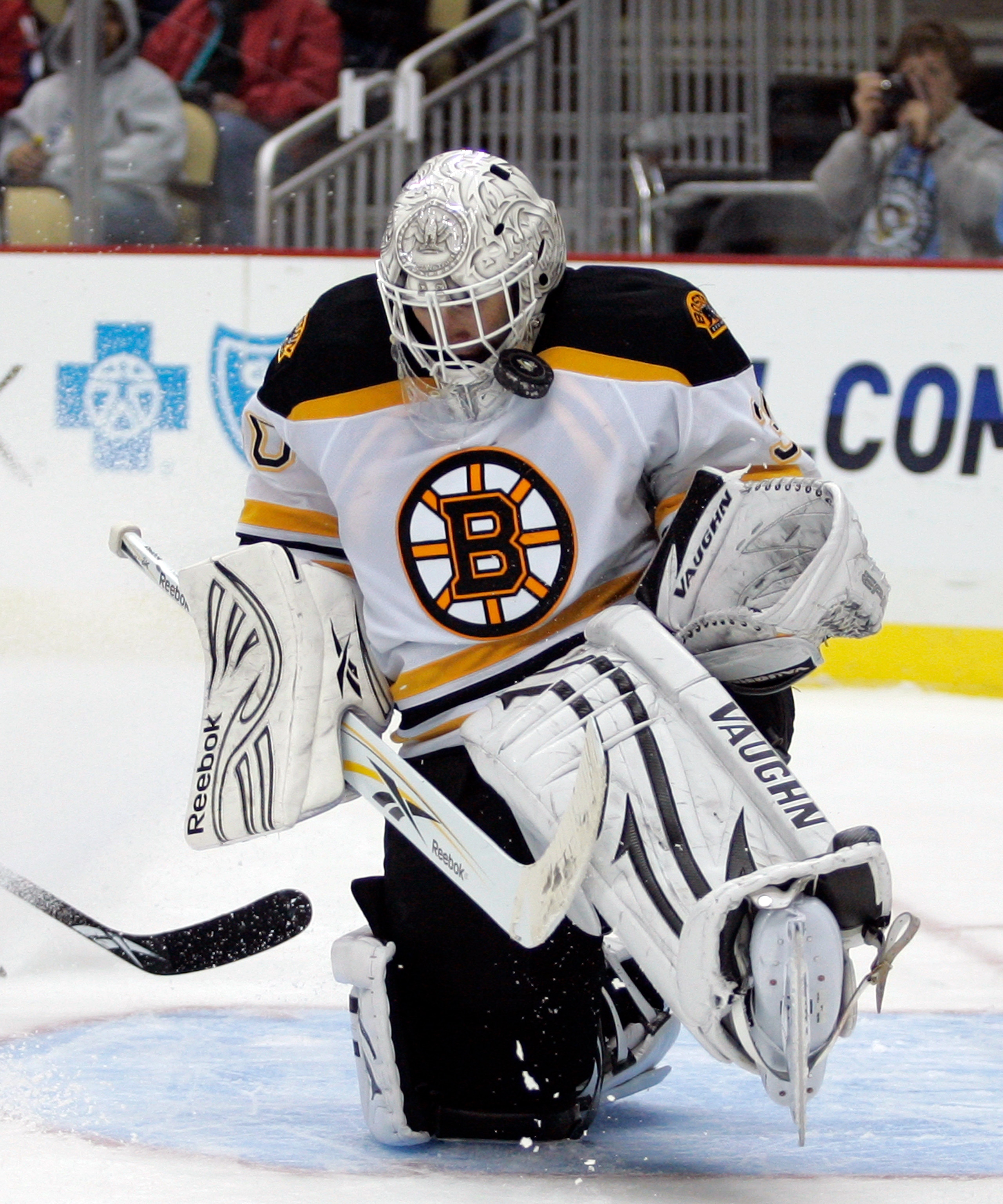 PITTSBURGH - NOVEMBER 10: Tim Thomas #30 of the Boston Bruins makes a save against the Pittsburgh Penguins in the third period at Consol Energy Center on November 10, 2010 in Pittsburgh, Pennsylvania. The Bruins defeated the Penguins 7-4. (Photo by Jus PITTSBURGH - NOVEMBER 10: Tim Thomas #30 of the Boston Bruins makes a save against the Pittsburgh Penguins in the third period at Consol Energy Center on November 10, 2010 in Pittsburgh, Pennsylvania. The Bruins defeated the Penguins 7-4. (Photo by Jus