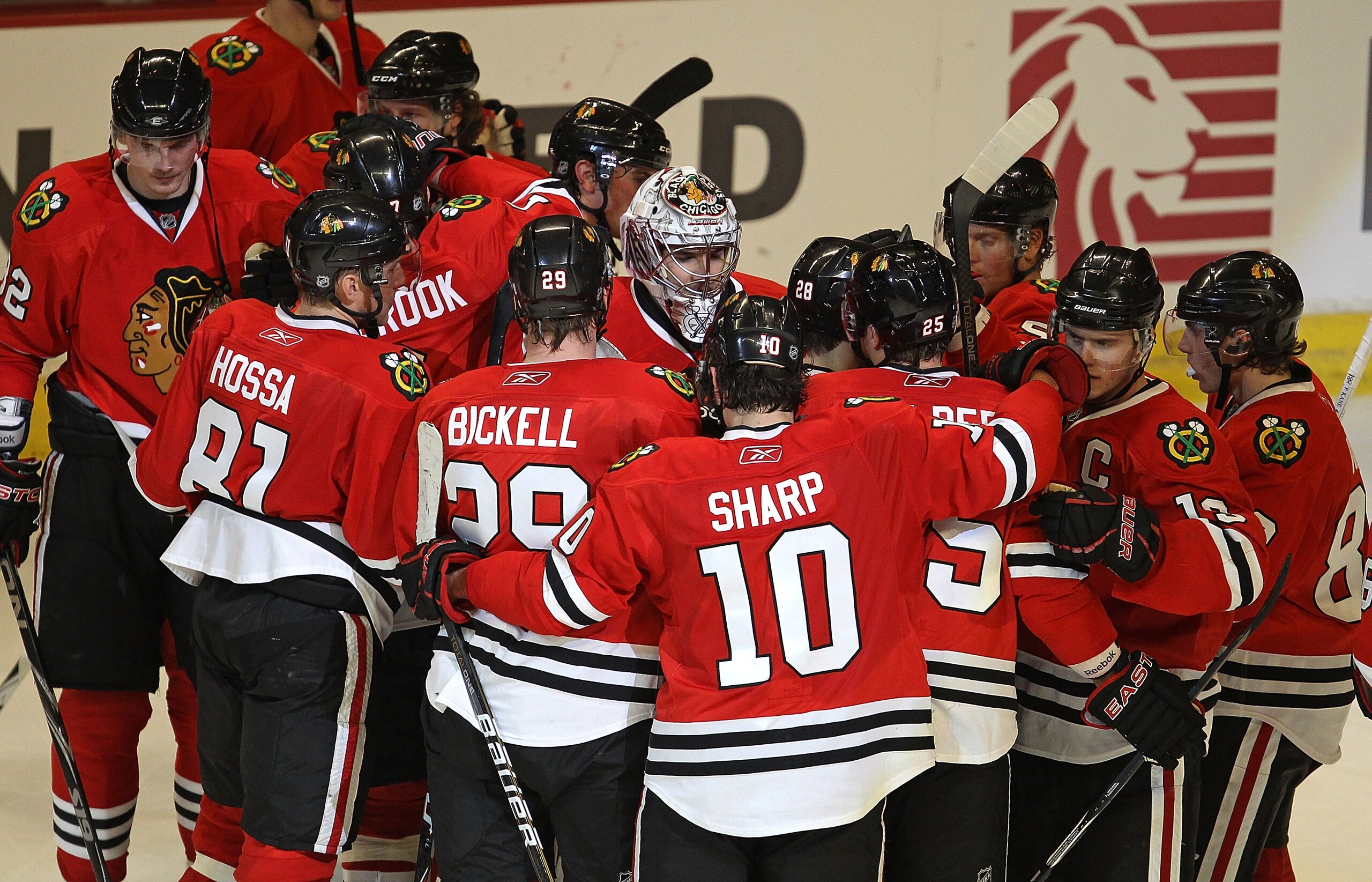 CHICAGO, IL - FEBRUARY 27: Corey Crawford #50 of the Chicago Blackhawks (center with mask) is surrounded by teammates including Marian Hossa #81, Bryan Bickell #29 and Patrick Sharp #10 after a win over the Phoenix Coyotes at the United Center on February CHICAGO, IL - FEBRUARY 27: Corey Crawford #50 of the Chicago Blackhawks (center with mask) is surrounded by teammates including Marian Hossa #81, Bryan Bickell #29 and Patrick Sharp #10 after a win over the Phoenix Coyotes at the United Center on February