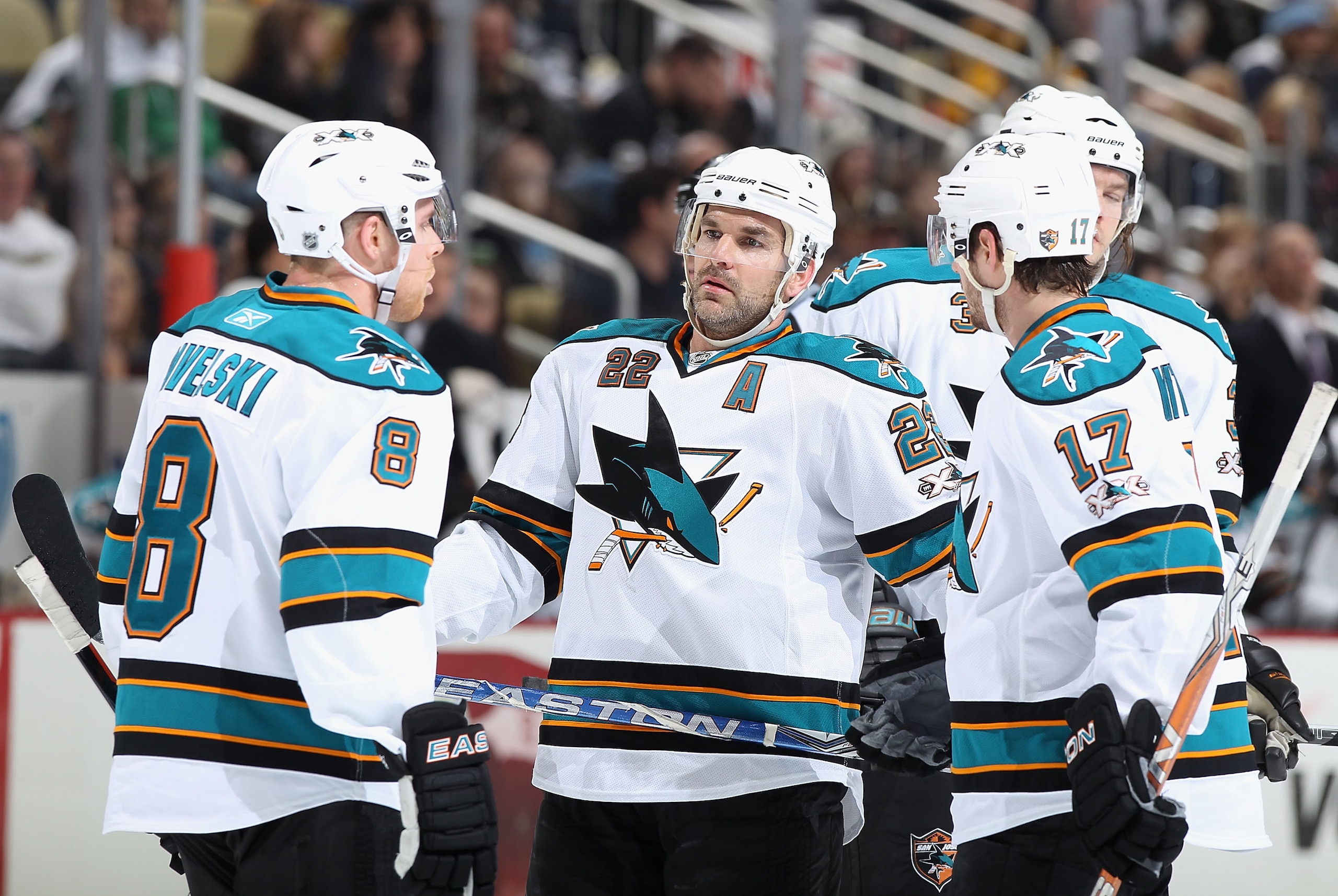 PITTSBURGH, PA - FEBRUARY 23: (L-R) Joe Pavelski #8, Dan Boyle #22 and Torrey Mitchell #17 of the San Jose Sharks talk during the NHL game against the Pittsburgh Penguins at Consol Energy Center on February 23, 2011 in Pittsburgh, Pennsylvania. The Shar PITTSBURGH, PA - FEBRUARY 23: (L-R) Joe Pavelski #8, Dan Boyle #22 and Torrey Mitchell #17 of the San Jose Sharks talk during the NHL game against the Pittsburgh Penguins at Consol Energy Center on February 23, 2011 in Pittsburgh, Pennsylvania. The Shar