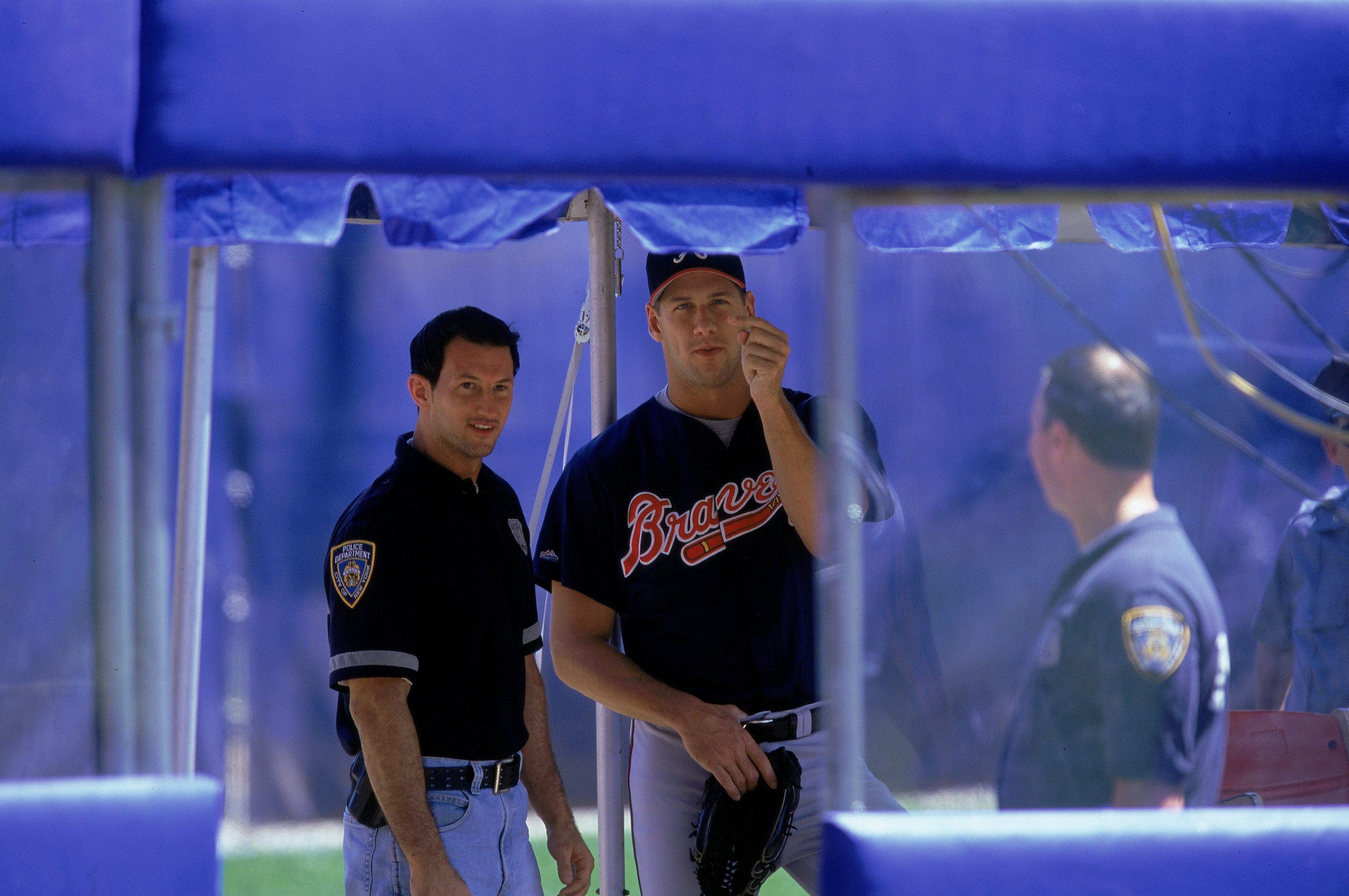 1 Jul 2000:  Pitcher John Rocker #49 of the Atlanta Braves is waiting with his NYPD escort during the game against the New York Mets at Shea Stadium in Flushing, New York. The Mets defeated the Braves 9-1.Mandatory Credit: Ezra O. Shaw  /Allsport