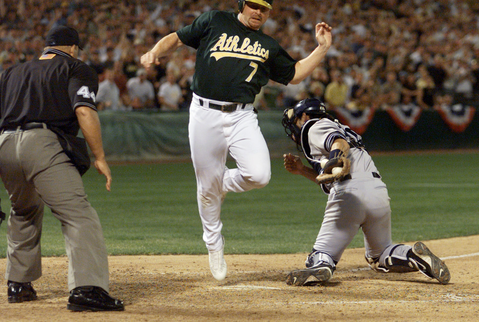 13 Oct 2001:  Jeremy Giambi of the Oakland A's is tagged out by Jorge Posada of the New York Yankees during game three of the American League Divisional Series at the Network Associaties Ceolesium in Oakland, Ca. < DIGITAL IMAGE> Mandatory Credit: Jed Jac
