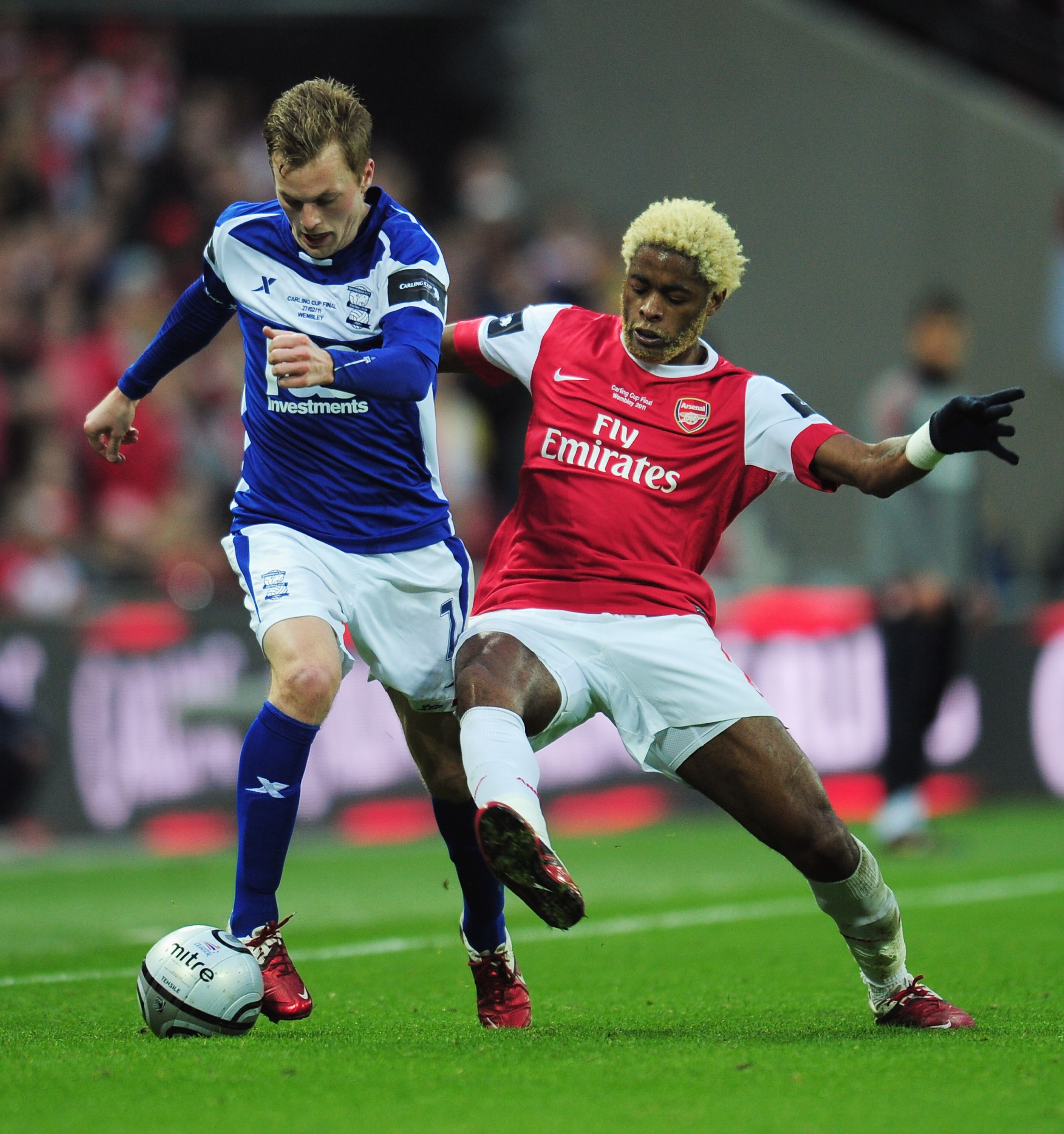 LONDON, ENGLAND - FEBRUARY 27: Alex Song of Arsenal challenges Sebastian Larsson of Birmingham City during the Carling Cup Final between Arsenal and Birmingham City at Wembley Stadium on February 27, 2011 in London, England.  (Photo by Shaun Botterill/Get