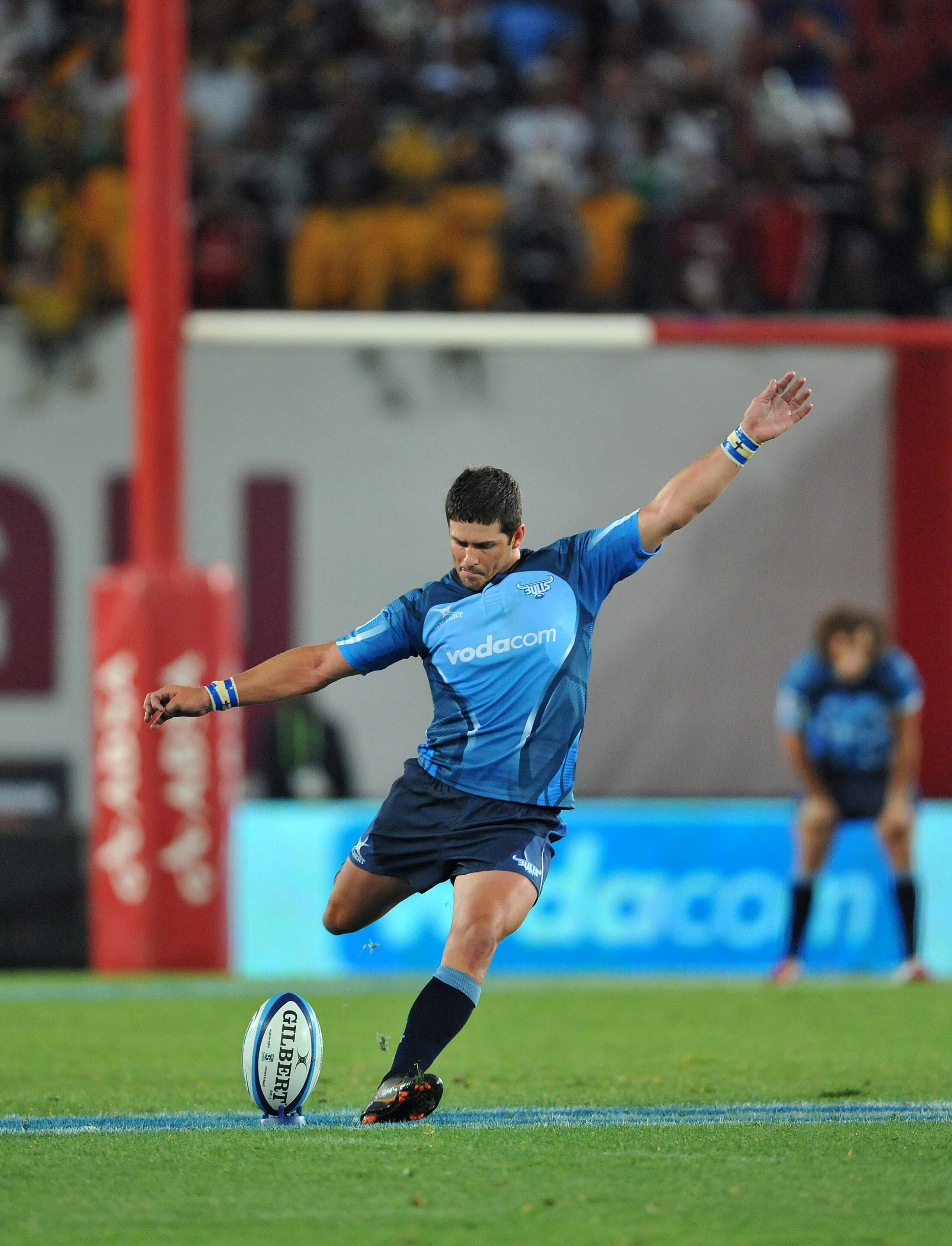JOHANNESBURG, SOUTH AFRICA - FEBRUARY 19:  Morne Steyn of the Bulls kicks a conversion during the Super Rugby Round 1 match between Lions and Vodacom Bulls at Coca Cola Park on February 19, 2011 in Johannesburg, South Africa.  (Photo by Duif du Toit / Gal