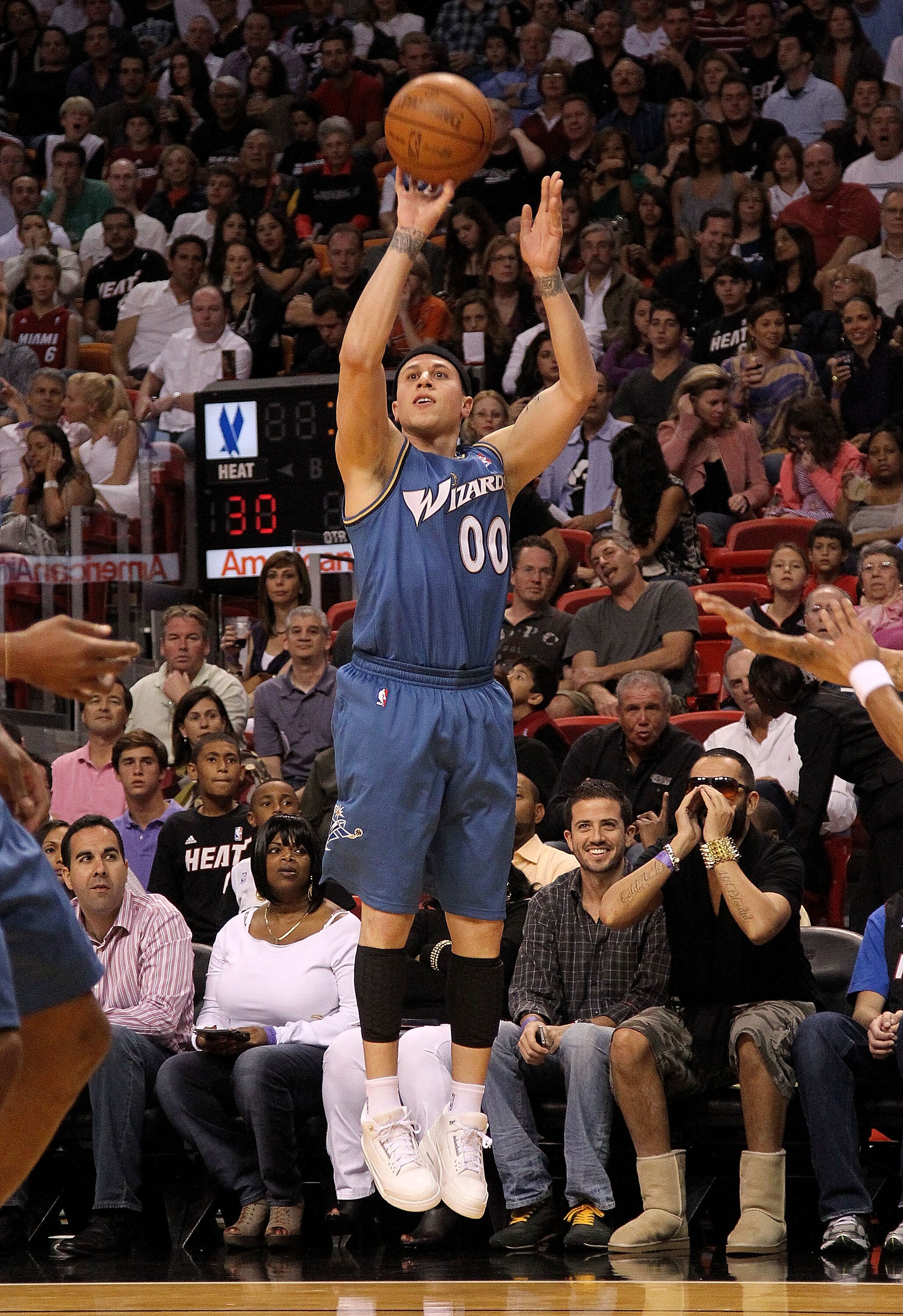MIAMI, FL - FEBRUARY 25:  Mike Bibby #00 of the  Washington Wizards shoots a jump shot during a game against the Miami Heat  at American Airlines Arena on February 25, 2011 in Miami, Florida. NOTE TO USER: User expressly acknowledges and agrees that, by d