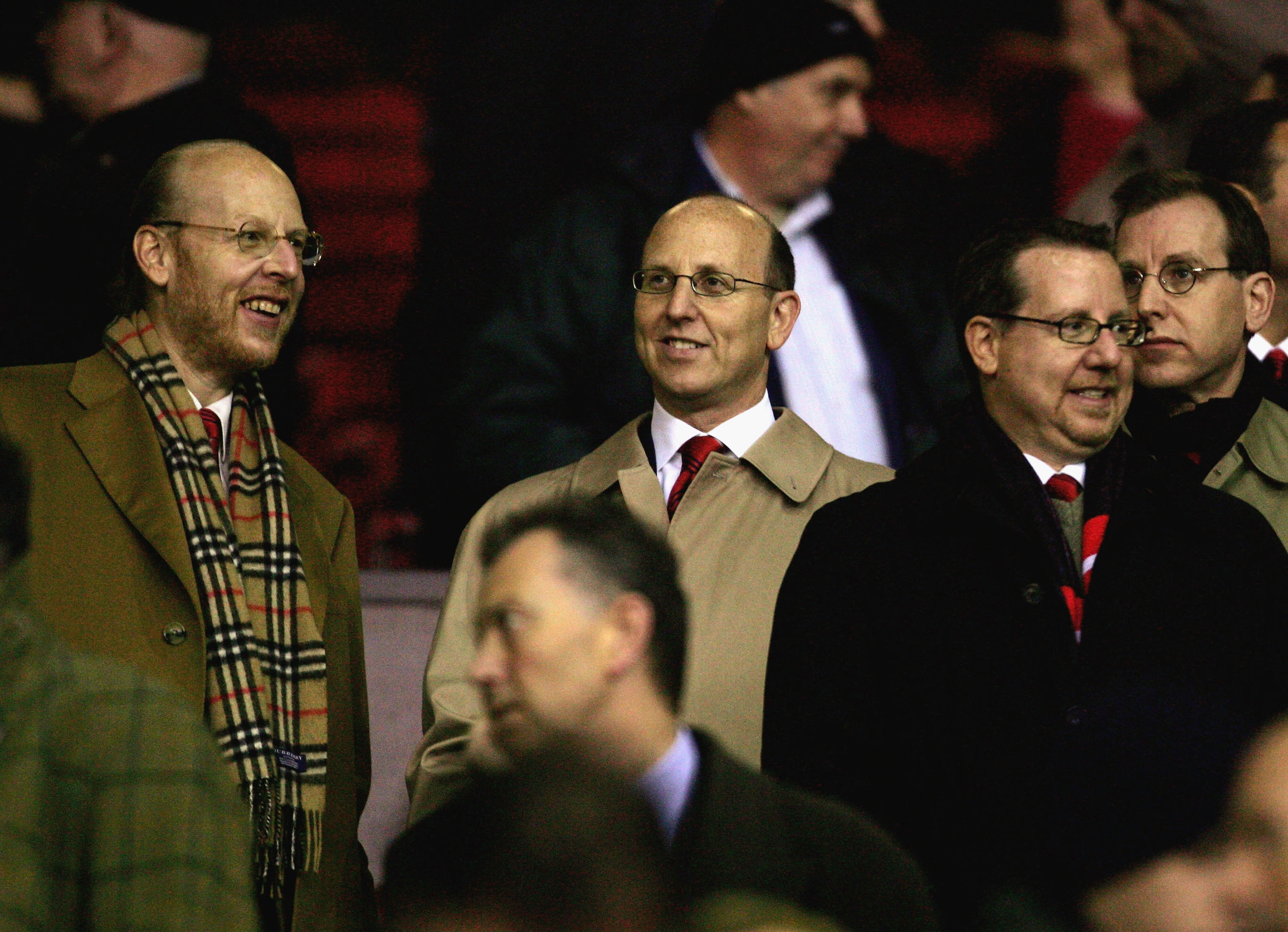 MANCHESTER, UNITED KINGDOM - NOVEMBER 22: Manchester United board members Avi Glazer, Joel Glazer and Brian Glazer watch on prior to the UEFA Champions League match between Manchester United and Villarreal at Old Trafford on November 22, 2005 in Mancheste