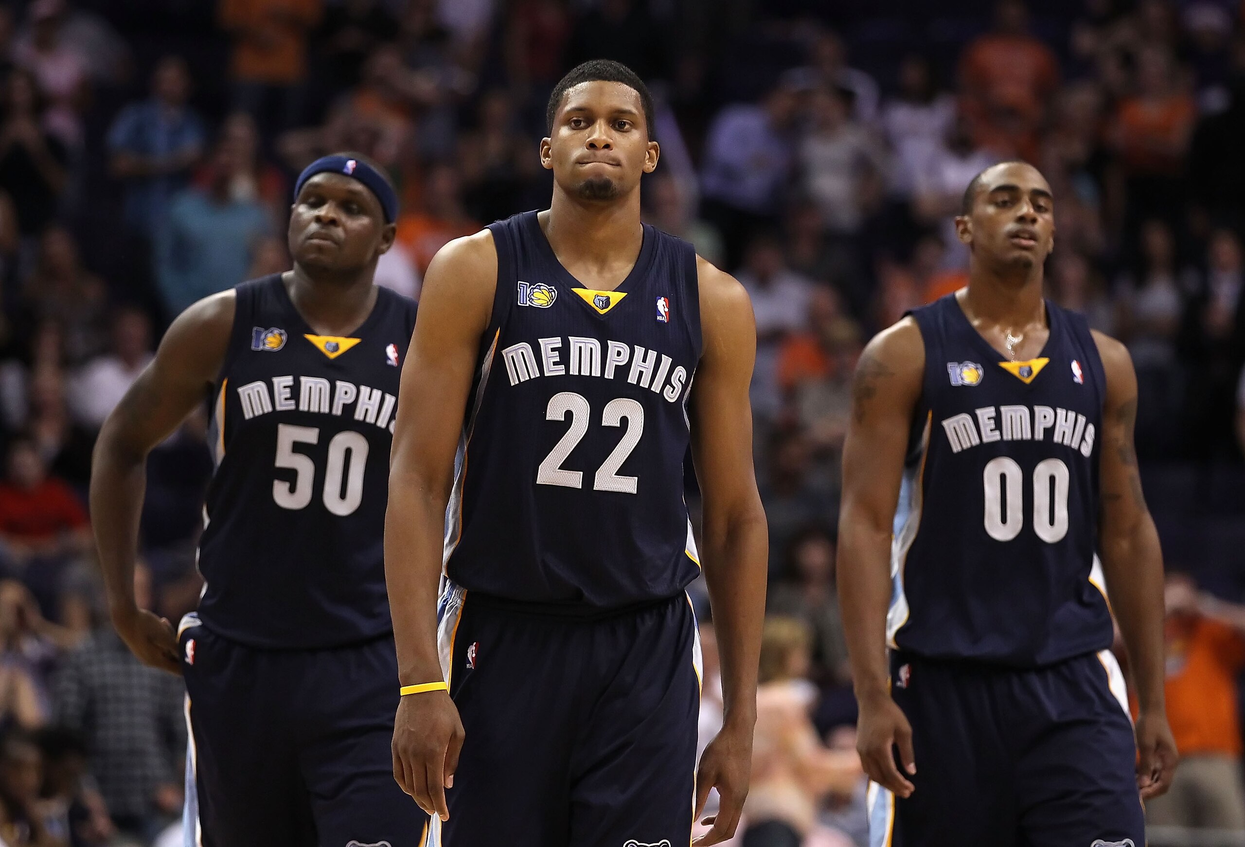 PHOENIX - NOVEMBER 05:  (L-R) Zach Randolph #50, Rudy Gay #22 and Darrell Arthur #00 of the Memphis Grizzlies react in the final moments of the NBA game against the Phoenix Suns at US Airways Center on November 5, 2010 in Phoenix, Arizona. The Suns defeat