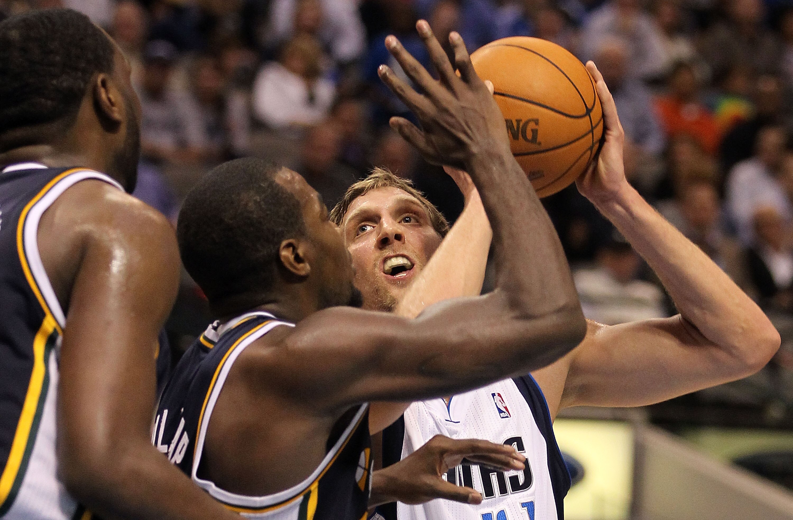DALLAS, TX - FEBRUARY 23:  Forward Dirk Nowitzki #41 of the Dallas Mavericks takes a shot against Paul Millsap #24 of the Utah Jazz at American Airlines Center on February 23, 2011 in Dallas, Texas.  NOTE TO USER: User expressly acknowledges and agrees th