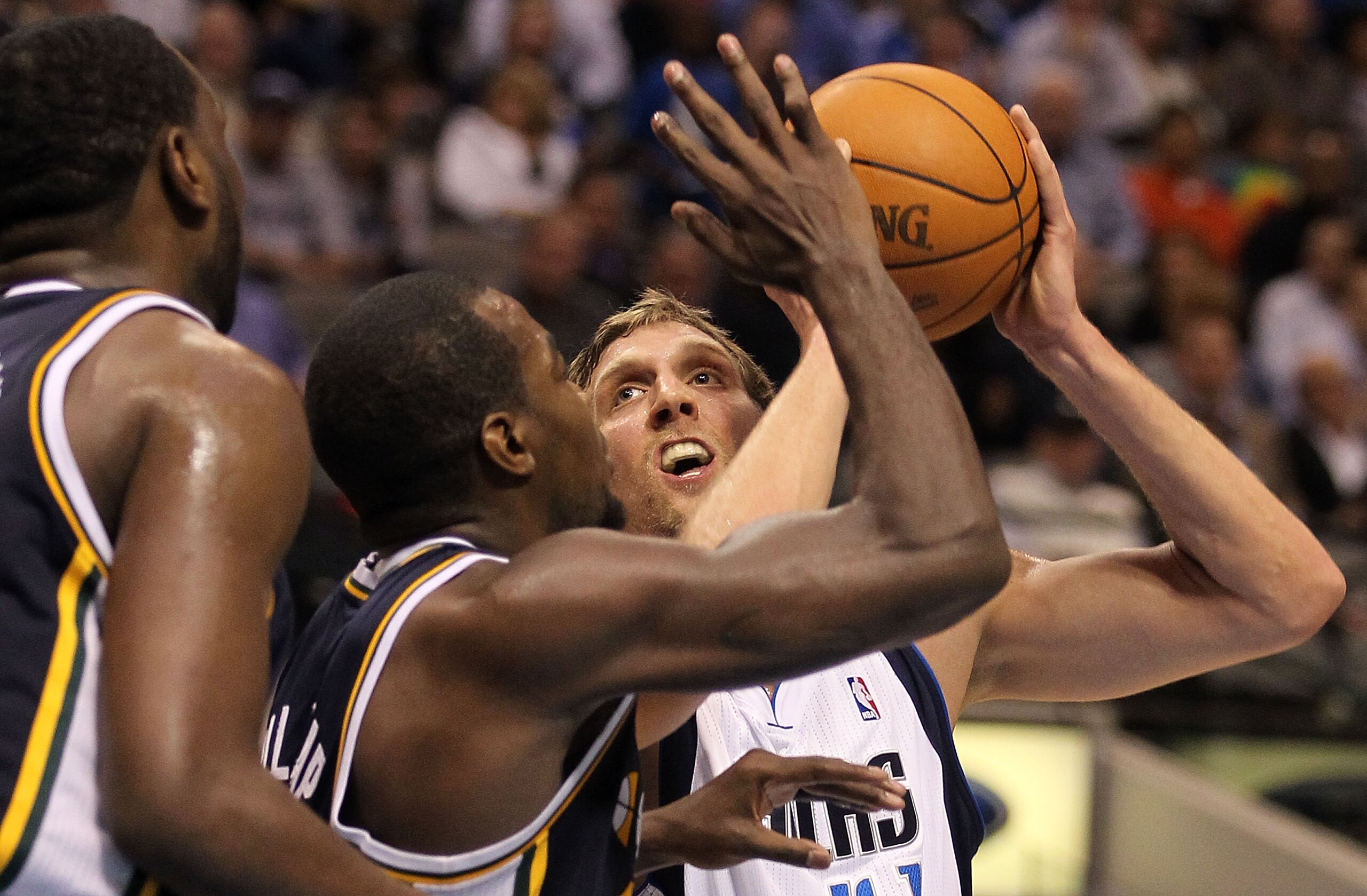 DALLAS, TX - FEBRUARY 23:  Forward Dirk Nowitzki #41 of the Dallas Mavericks takes a shot against Paul Millsap #24 of the Utah Jazz at American Airlines Center on February 23, 2011 in Dallas, Texas.  NOTE TO USER: User expressly acknowledges and agrees th
