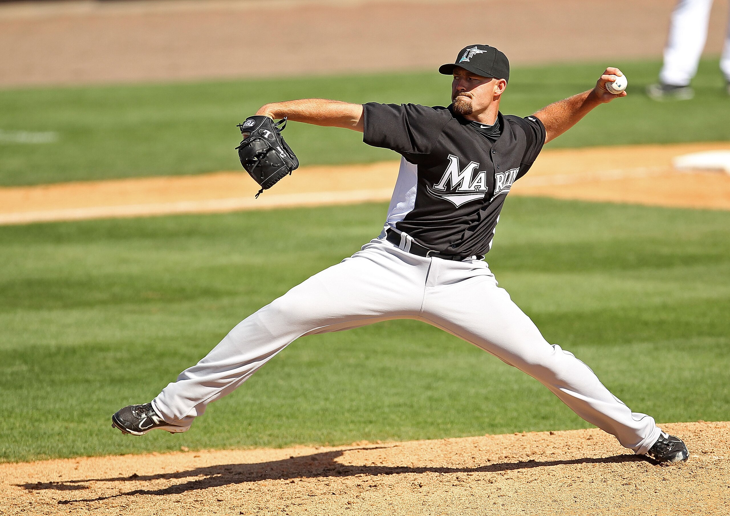 VIERA, FL - MARCH 02:  Mike Dunn #40  of the Florida Marlins pitches during a Spring Training game against the Washington Nationals at Space Coast Stadium on March 2, 2011 in Viera, Florida.  (Photo by Mike Ehrmann/Getty Images)