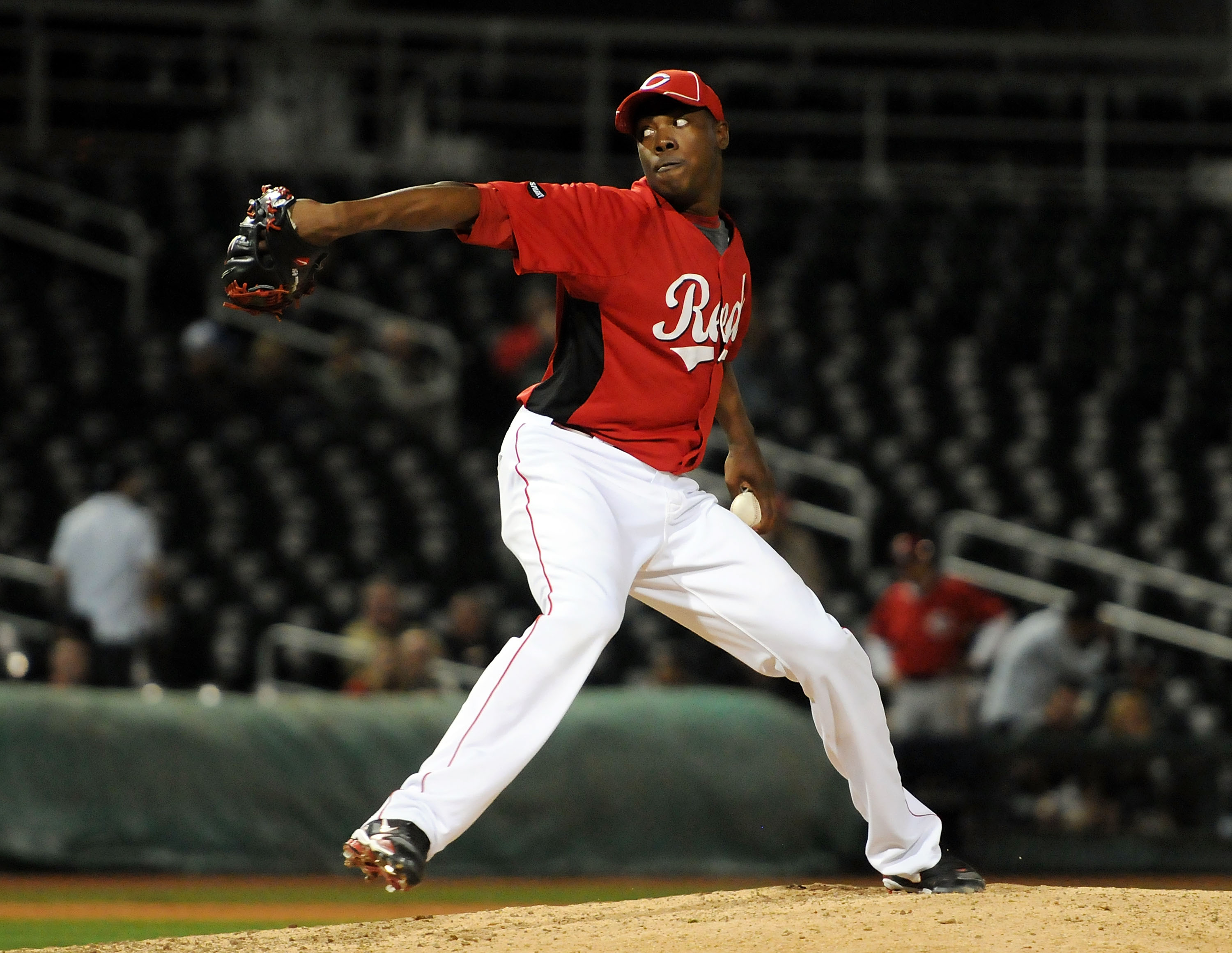 GOODYEAR, AZ - MARCH 03:  Aroldis Chapman #54 of the Cincinnati Reds delivers a pitch to the Los Angeles Dodgers at Goodyear Ballpark on March 3, 2011 in Goodyear, Arizona.  (Photo by Norm Hall/Getty Images)