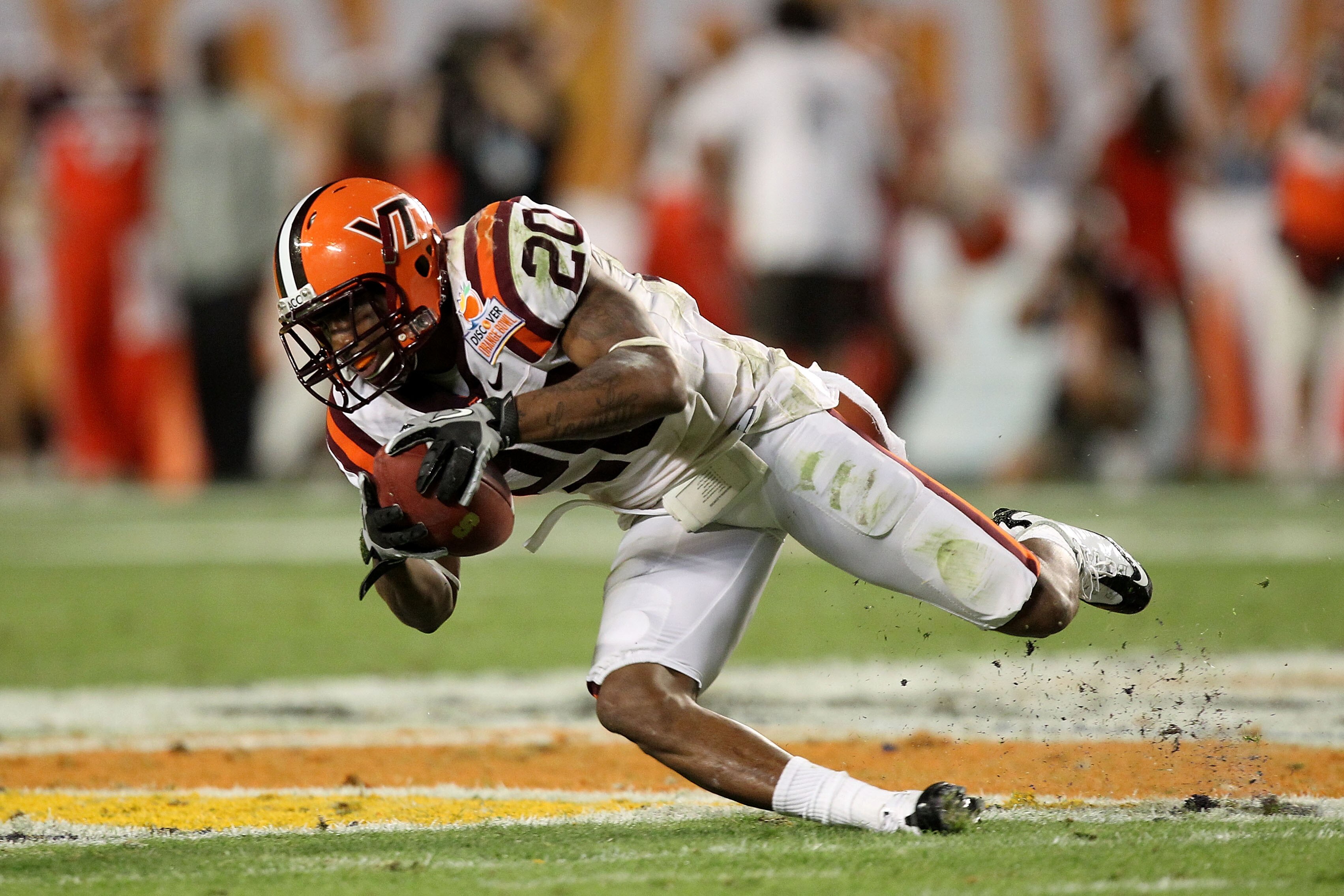 MIAMI, FL - JANUARY 03:  Jayron Hosley #20 of the Virginai Tech Hokies intercepts a pass in the second quarter against the Stanford Cardinal during the 2011 Discover Orange Bowl at Sun Life Stadium on January 3, 2011 in Miami, Florida.  (Photo by Streeter