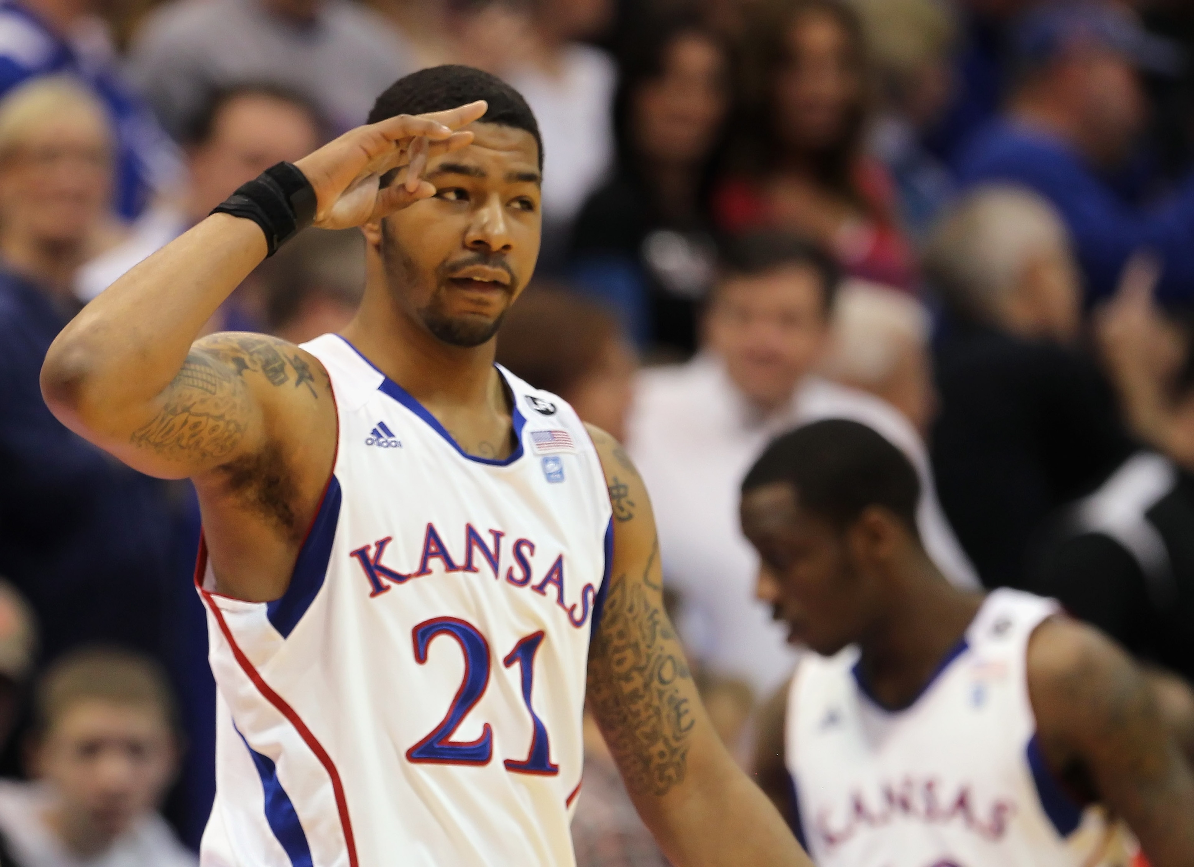 LAWRENCE, KS - FEBRUARY 12:  Markieff Morris #21 of the Kansas Jayhawks slautes the crowd during the game against the Iowa State Cyclones on February 12, 2011 at Allen Fieldhouse in Lawrence, Kansas.  (Photo by Jamie Squire/Getty Images)