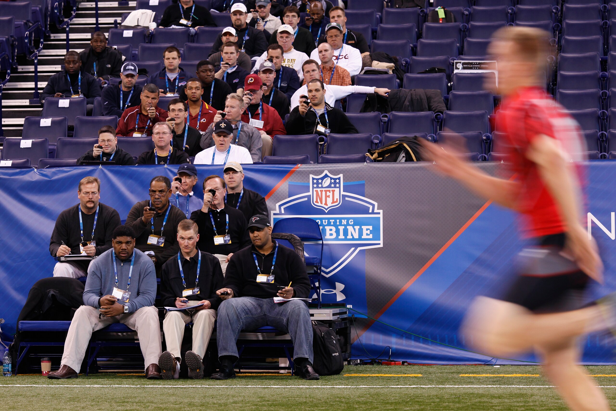 INDIANAPOLIS, IN - FEBRUARY 27: Team personnel record times in the 40-yard dash during the 2011 NFL Scouting Combine at Lucas Oil Stadium on February 27, 2011 in Indianapolis, Indiana. (Photo by Joe Robbins/Getty Images)