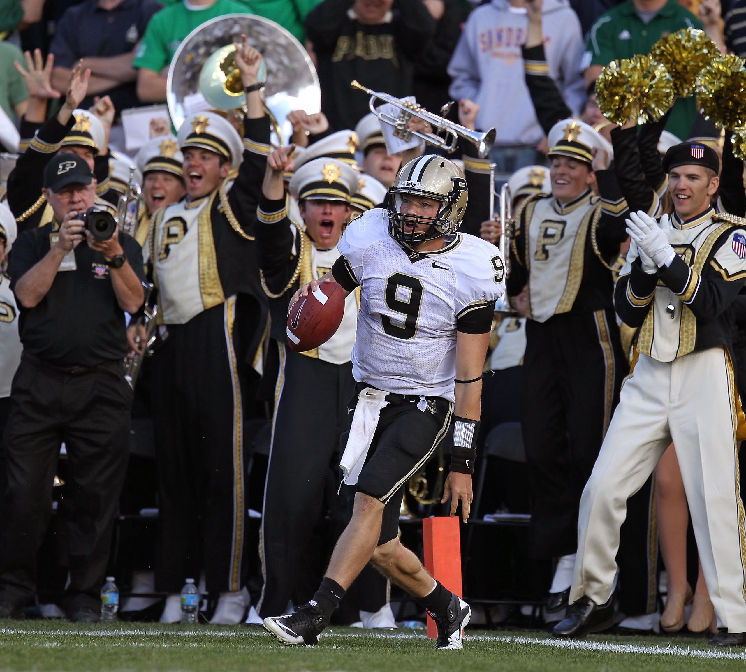 SOUTH BEND, IN - SEPTEMBER 04: Robert Marve #9 of the Purdue Boilermakers celebrates in the end zone after scoring a touchdown against the Notre Dame Fighting Irish at Notre Dame Stadium on September 4, 2010 in South Bend, Indiana. Notre Dame defated Purd