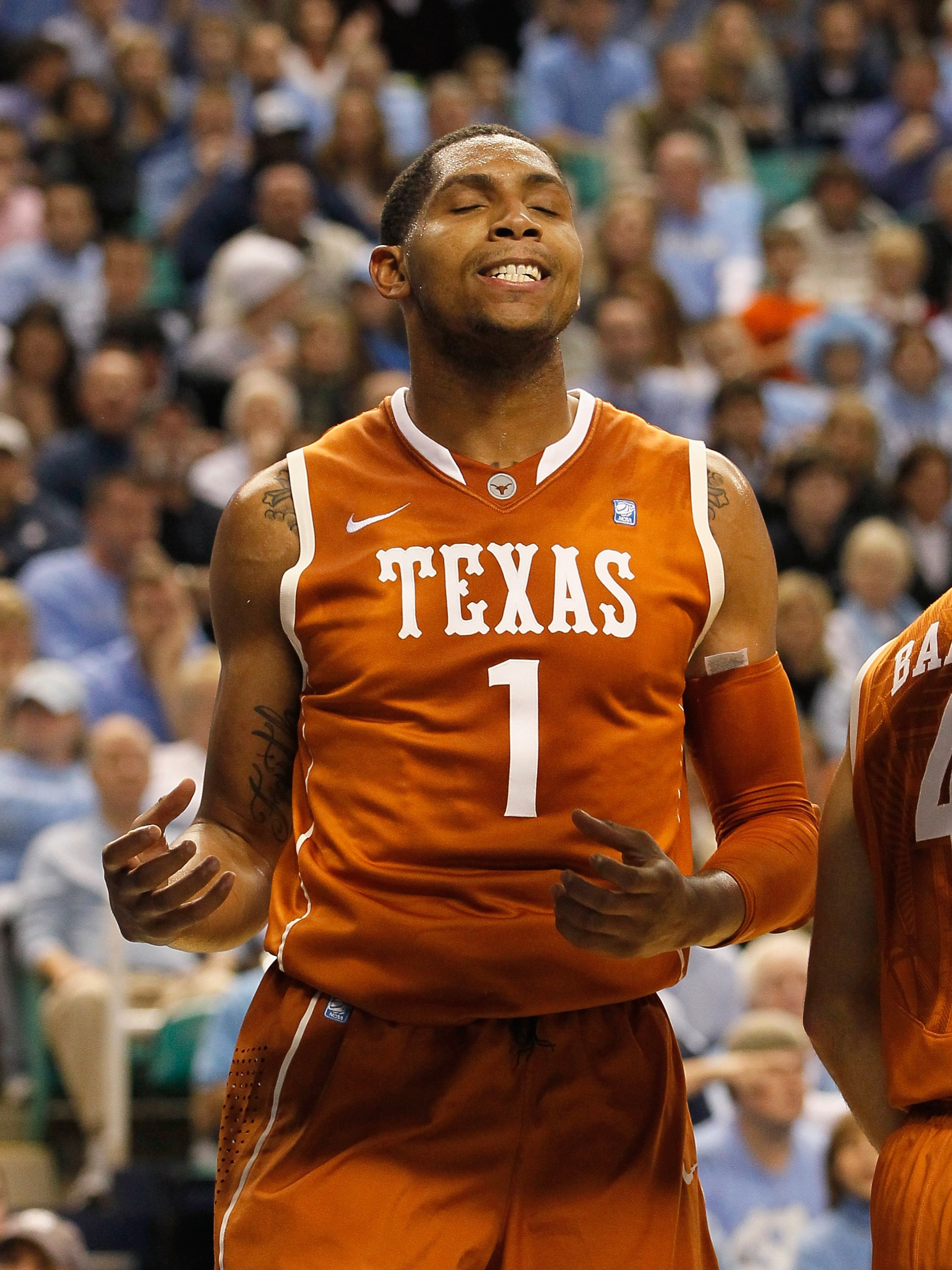 GREENSBORO, NC - DECEMBER 18:  Gary Johnson #1 of the Texas Longhorns against the North Carolina Tar Heels at Greensboro Coliseum on December 18, 2010 in Greensboro, North Carolina.  (Photo by Kevin C. Cox/Getty Images)