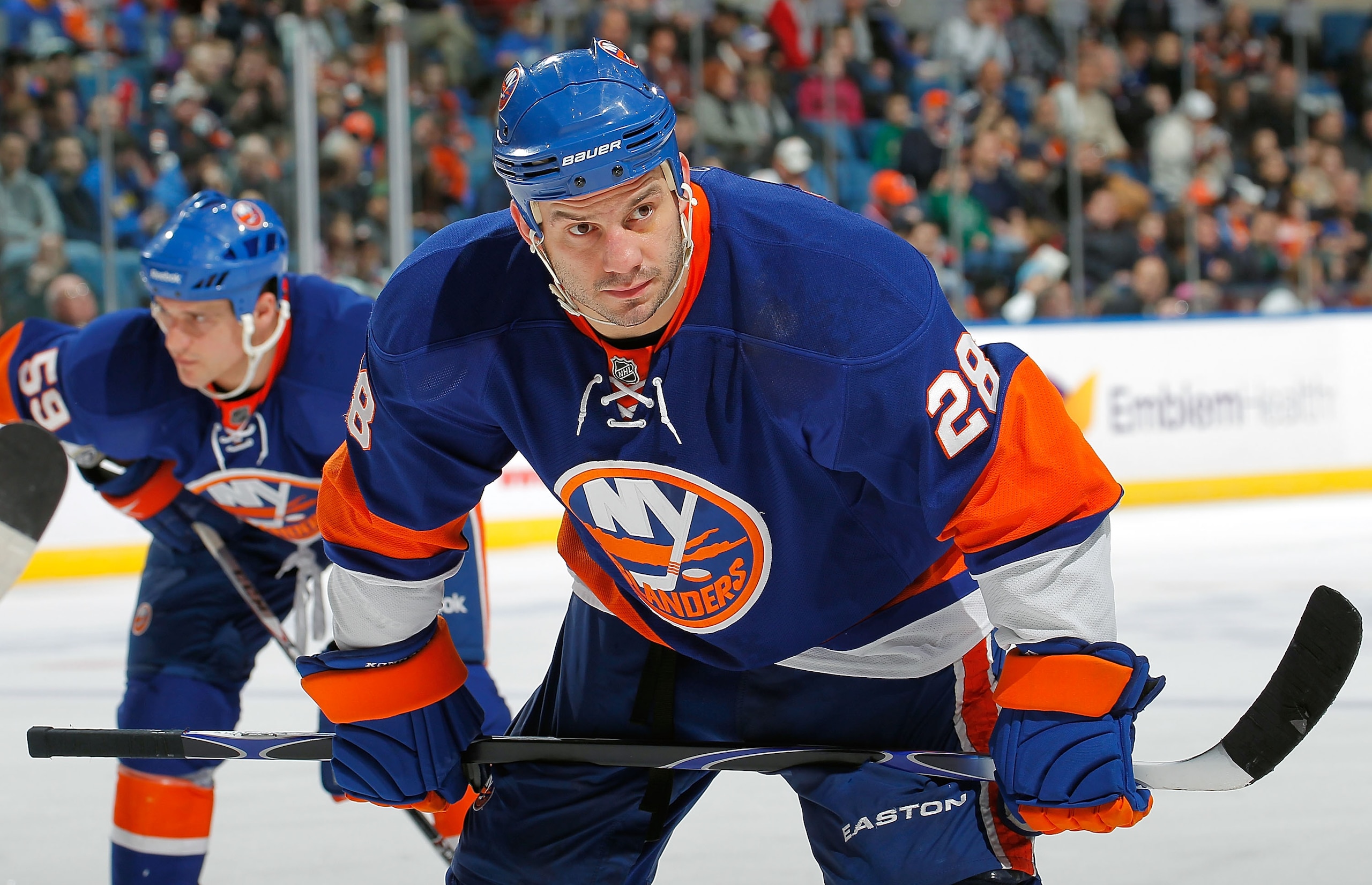 UNIONDALE, NY - FEBRUARY 21: Zenon Konopka #28 of the New York Islanders waits for a faceoff during an NHL hockey game against the Florida Panthers at the Nassau Coliseum on February 21, 2011 in Uniondale, New York. (Photo by Paul Bereswill/Getty Images UNIONDALE, NY - FEBRUARY 21: Zenon Konopka #28 of the New York Islanders waits for a faceoff during an NHL hockey game against the Florida Panthers at the Nassau Coliseum on February 21, 2011 in Uniondale, New York. (Photo by Paul Bereswill/Getty Images