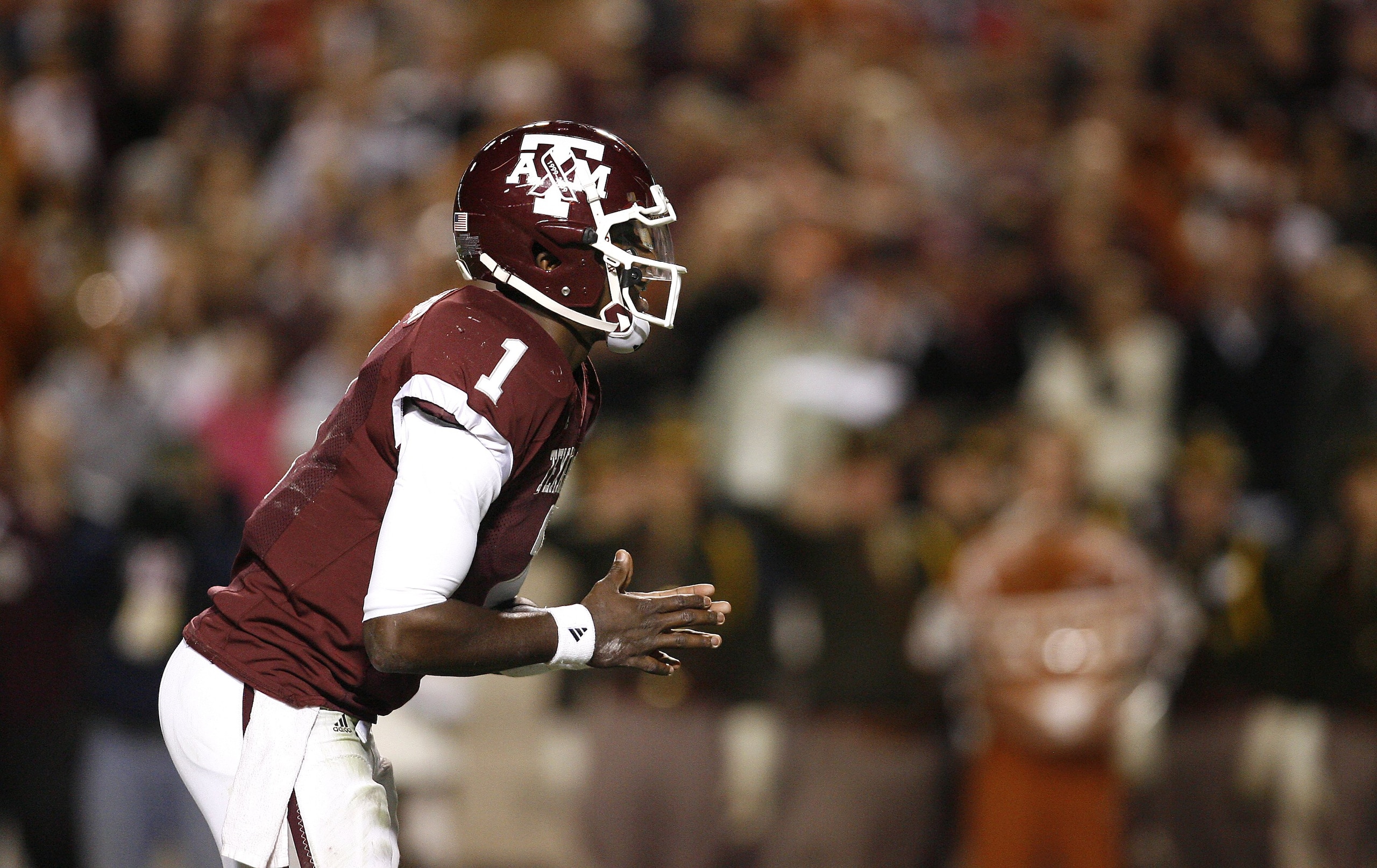 COLLEGE STATION, TX - NOVEMBER 26: Quarterback Jerrod Johnson #1 of the Texas A&M Aggies against the Texas Longhorns in the second half at Kyle Field on November 26, 2009 in College Station, Texas. The Longhorns defeated the Aggies 49-39 (Photo by Aaron M