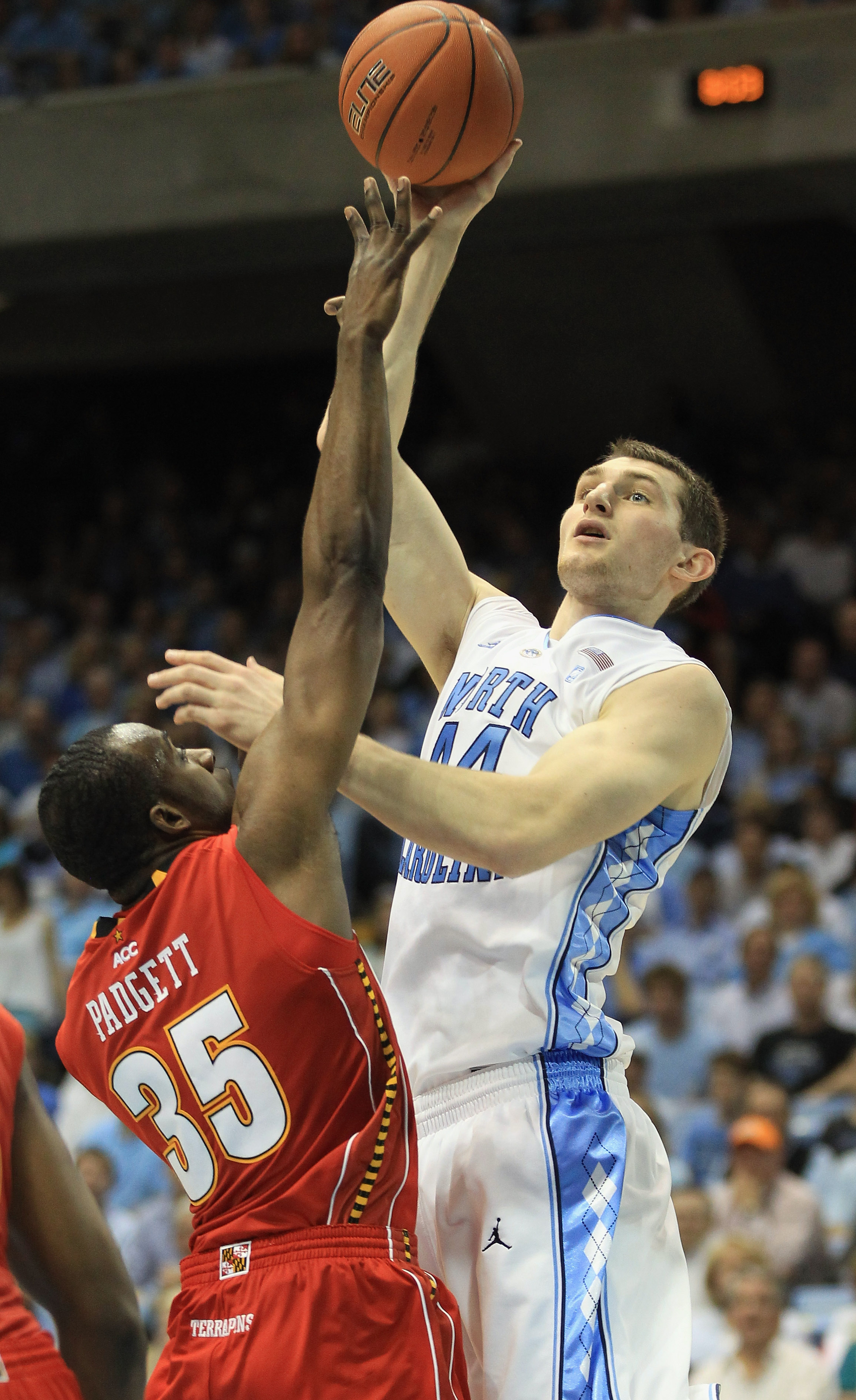 CHAPEL HILL, NC - FEBRUARY 27:  James Padgett #35 of the Maryland Terrapins tries to stop Tyler Zeller #44 of the North Carolina Tar Heels during their game at the Dean E. Smith Center on February 27, 2011 in Chapel Hill, North Carolina.  (Photo by Street